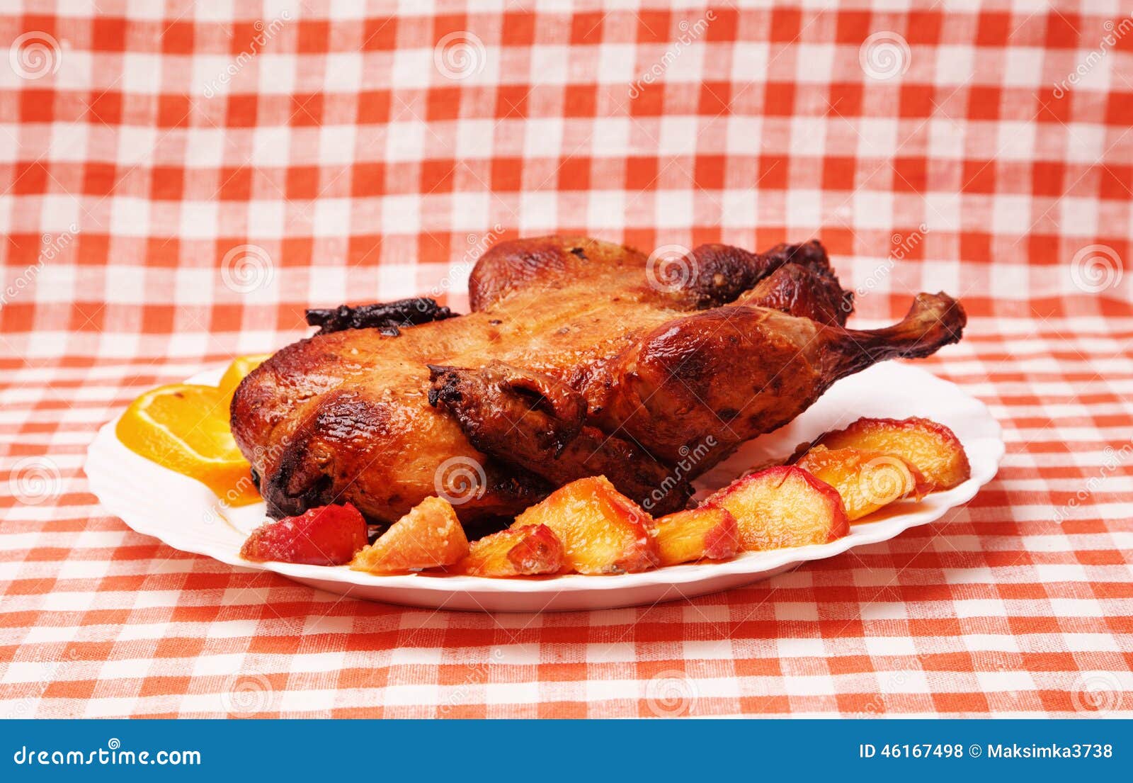 Roast duck with apples and oranges for christmas holidays