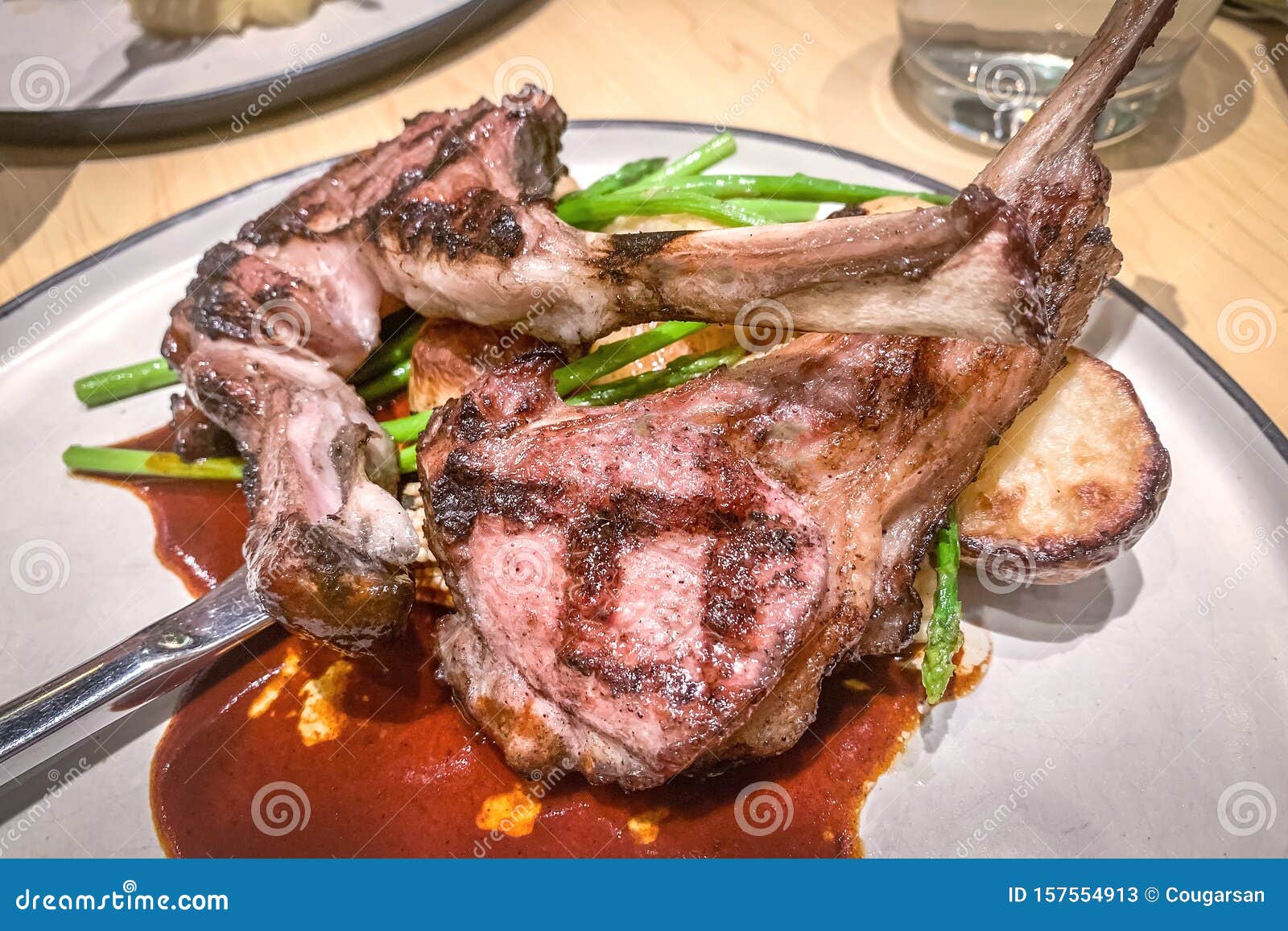 Roast Lamb Rack with Source. and Vegetable on Dish Stock Image Image