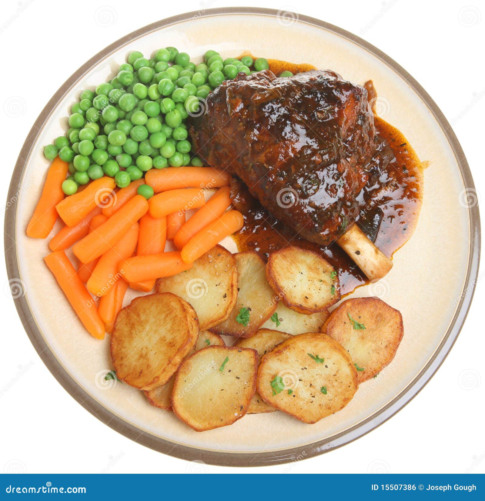 Roast Lamb Shank Dinner stock photo. Image of gravy, peas 15507386