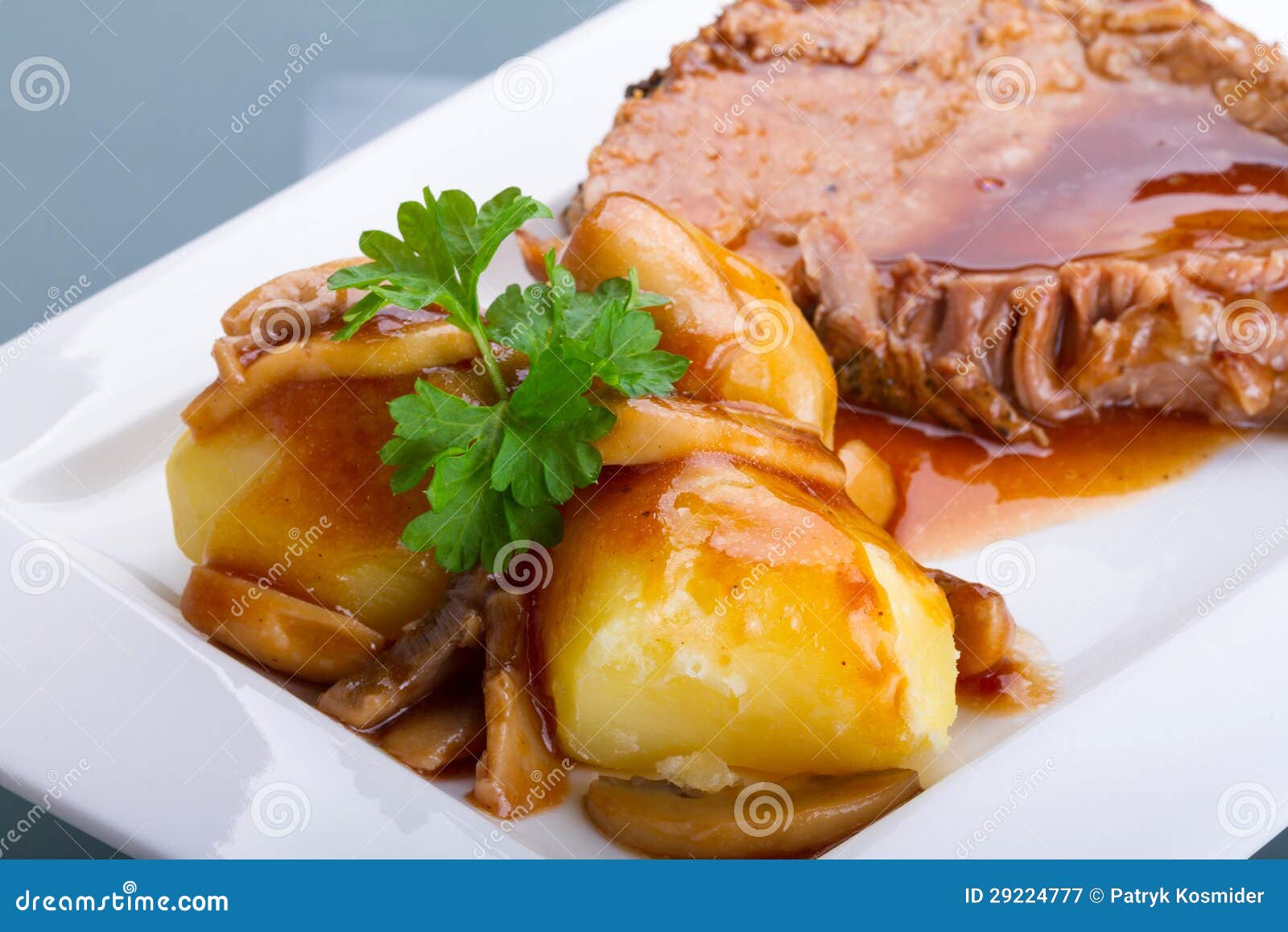 Roast Pork with Gravy and Potatoes Stock Image Image of dinner