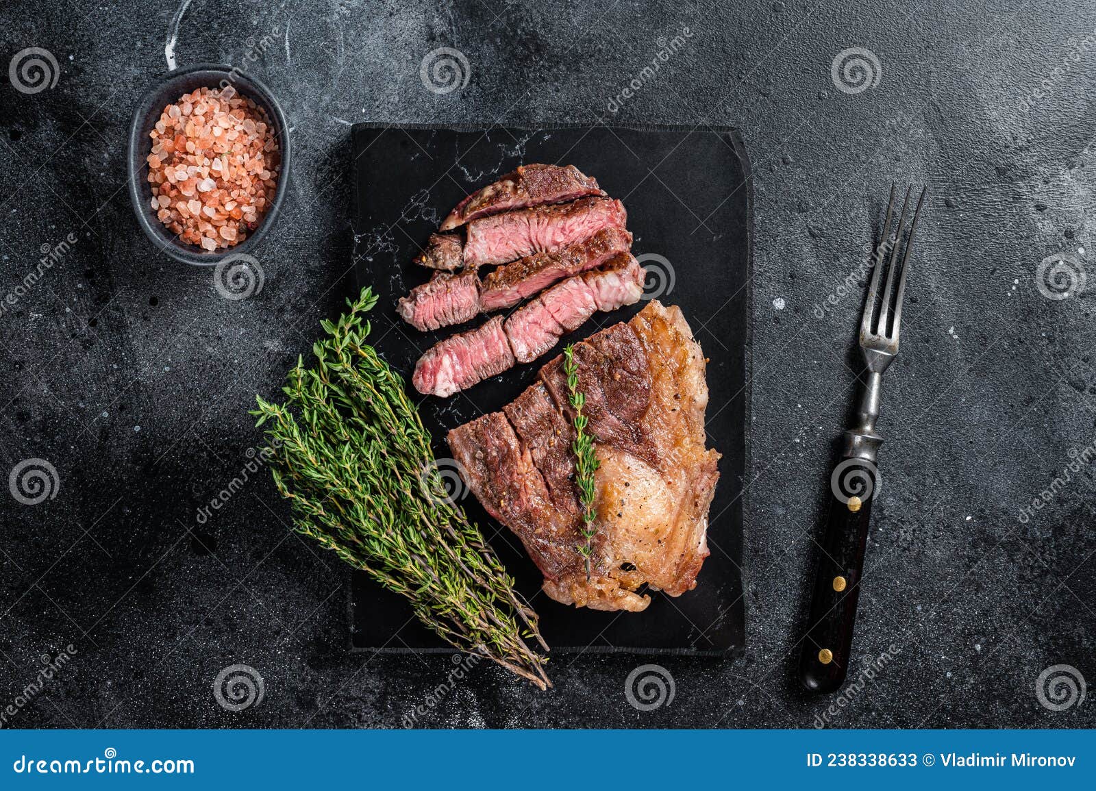 Roasted Bbq Chuck Roll Beef Steaks with Herbs. Black Background Stock