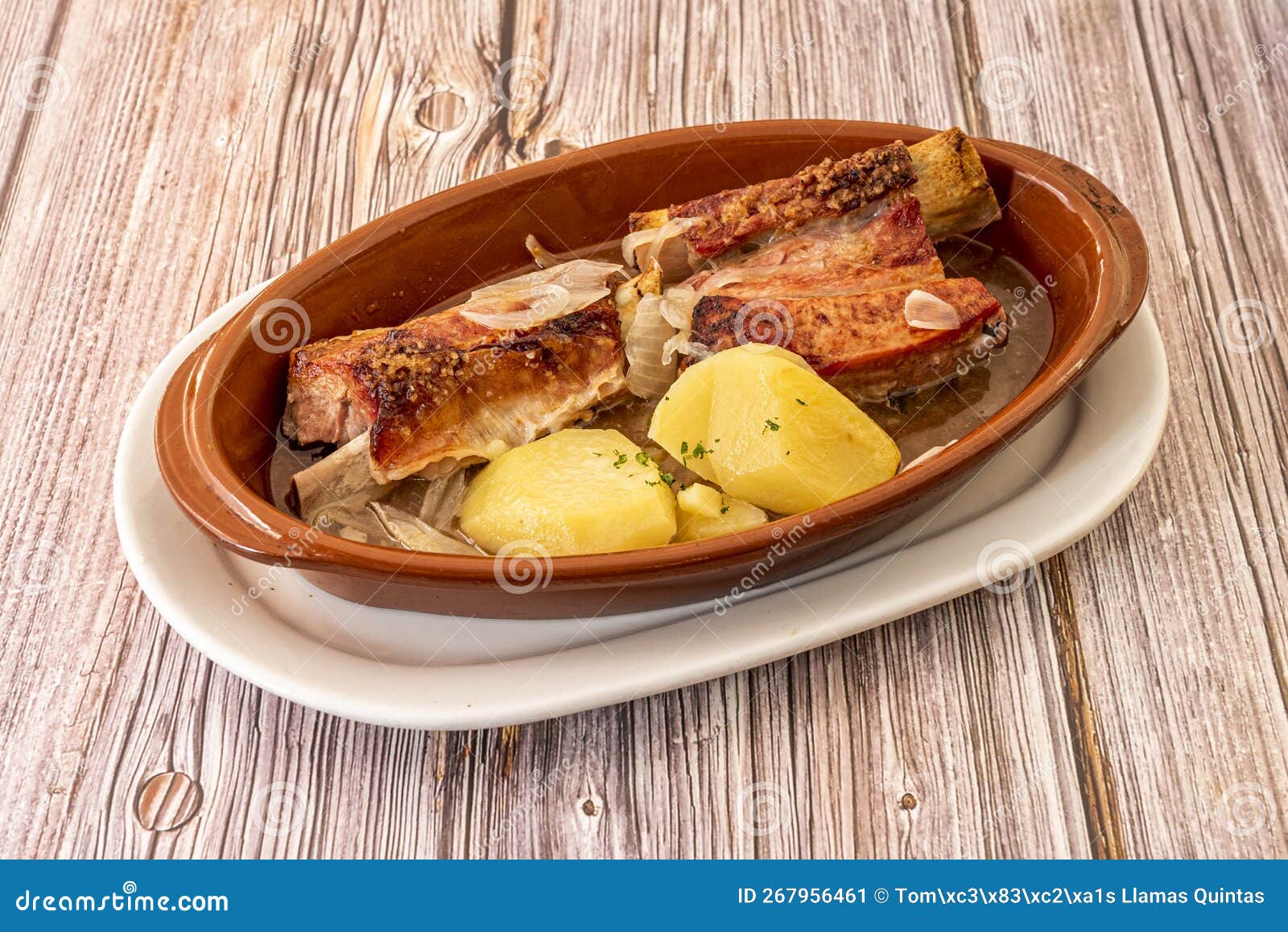 Roasted Beef Brisket with Baked Potatoes in a Clay Pot Stock Image