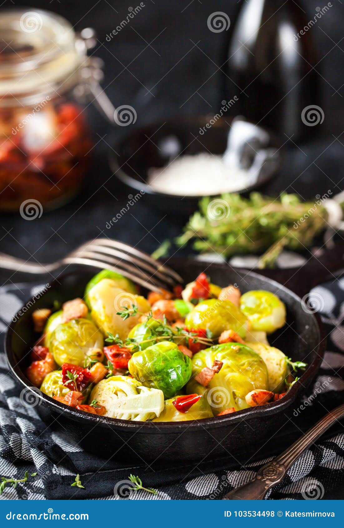 Roasted Brussels Sprouts with Bacon and Sun Dried Tomato Stock Photo