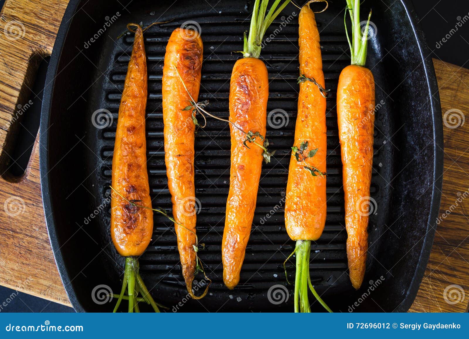 Roasted Carrots on a Black Cast Iron Skillet Stock Photo Image of