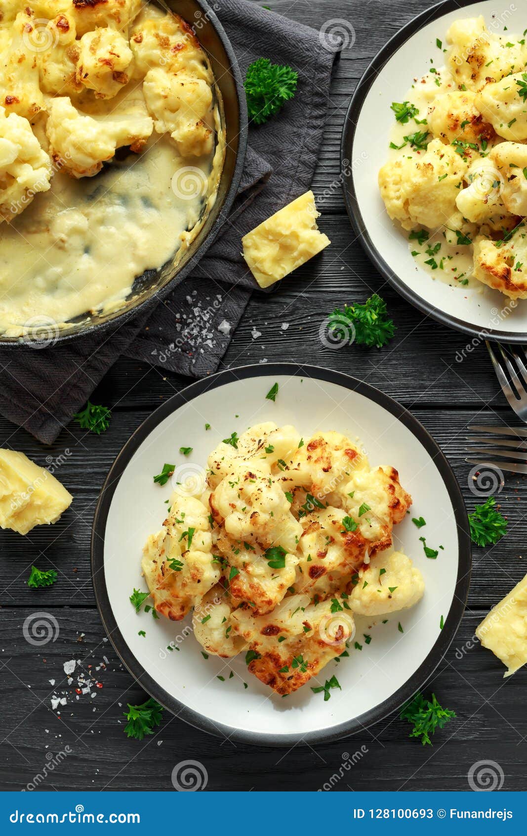 Roasted Cauliflower with Cheddar Cheese Sauce and Herbs. Stock Image