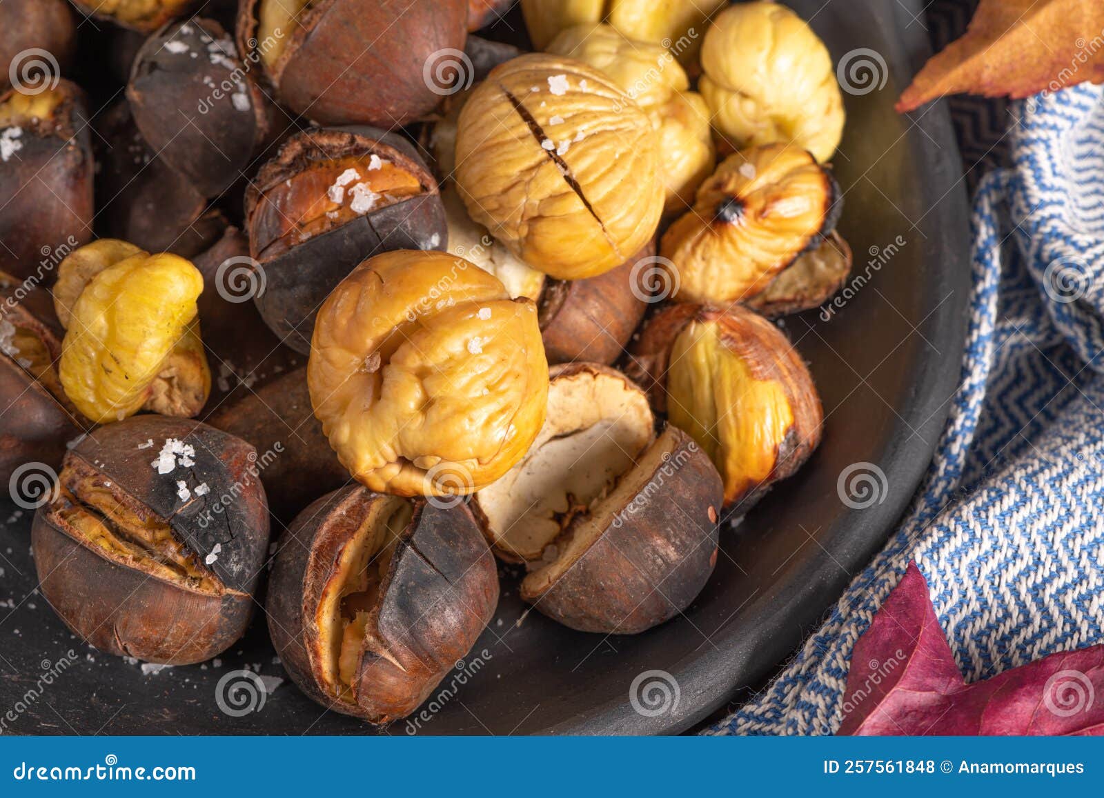 Roasted Chestnuts in Cast Iron Pan on an Old Board Stock Photo Image