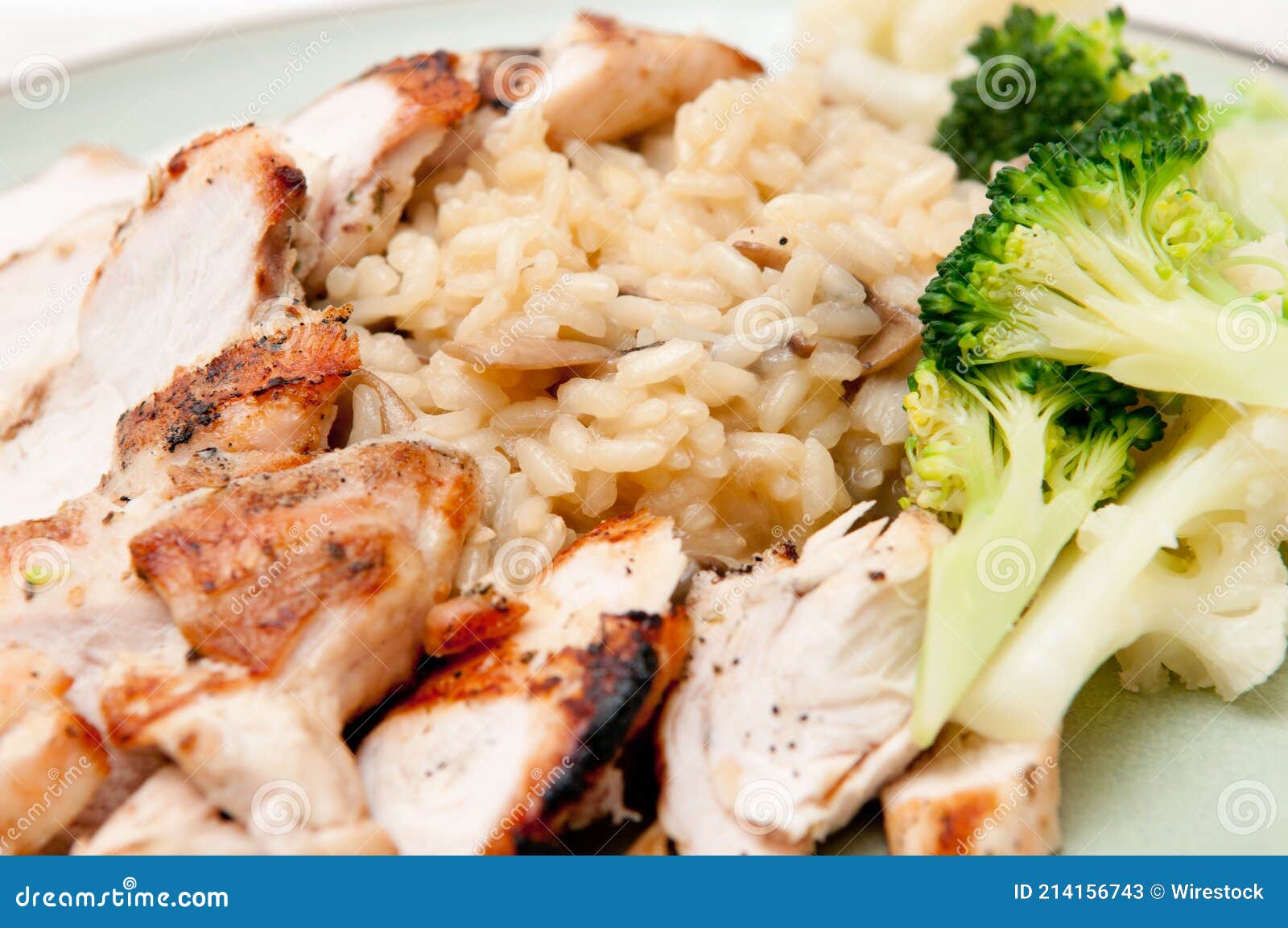 Roasted Chicken Breast and Brown Rice Served with Broccoli and