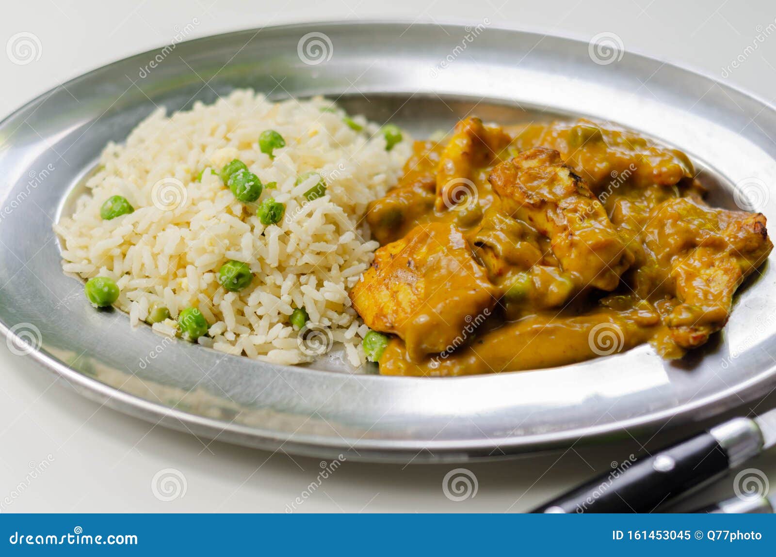 Roasted Chicken Breast Pieces in a Mildly Spiced Coconut Curry Sauce