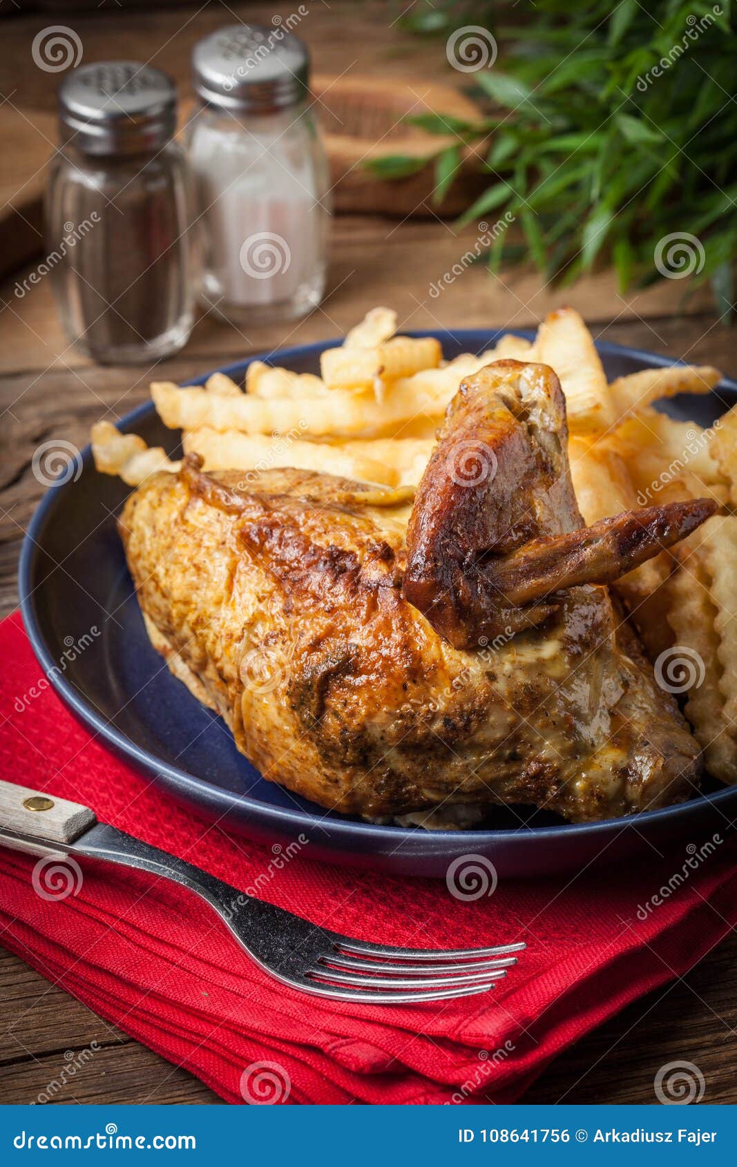 Roasted Chicken with French Fries on a Plate. Stock Photo - Image of ...