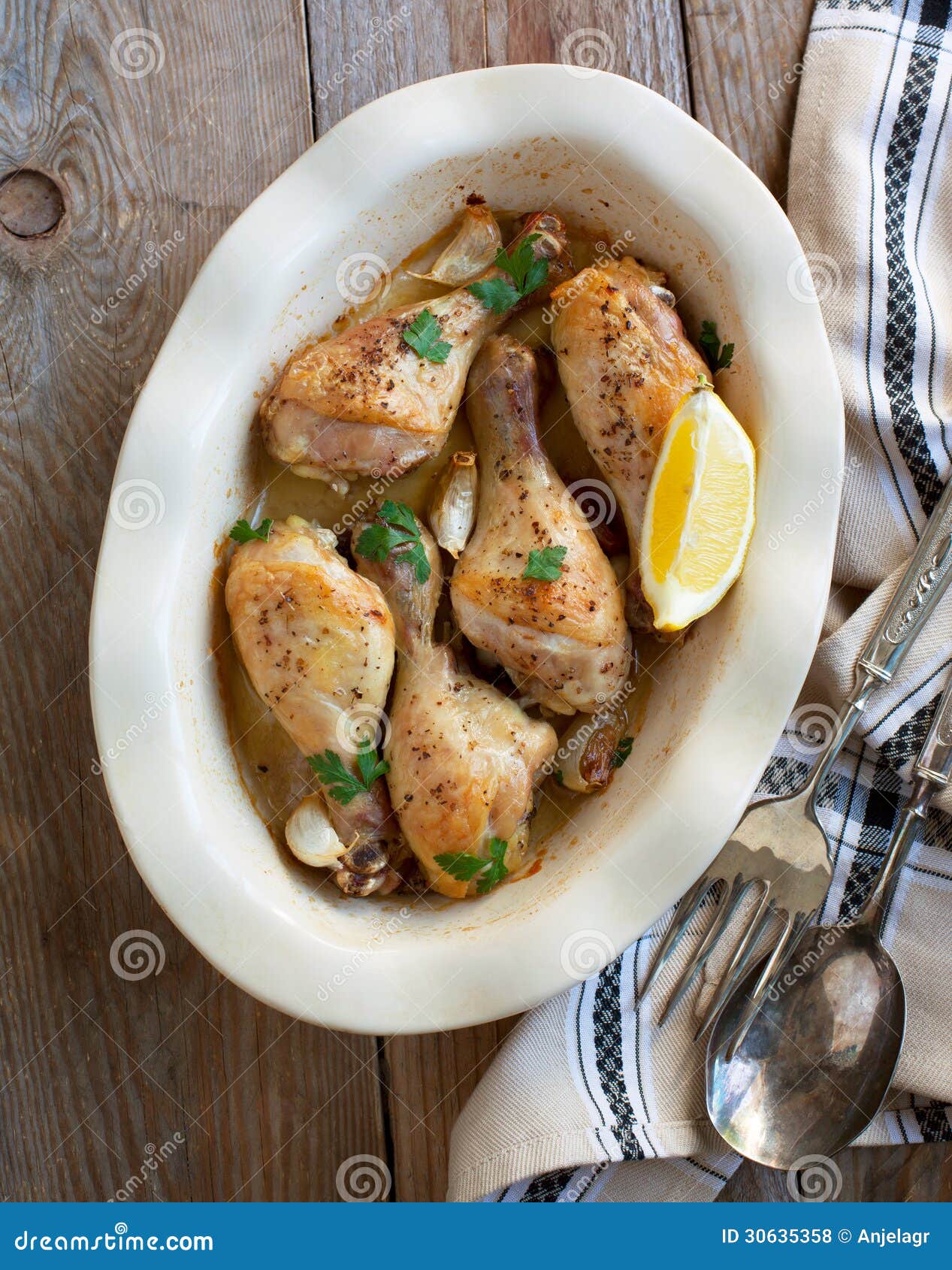 Roasted Chicken Legs with Lemon and Garlic Stock Photo Image of