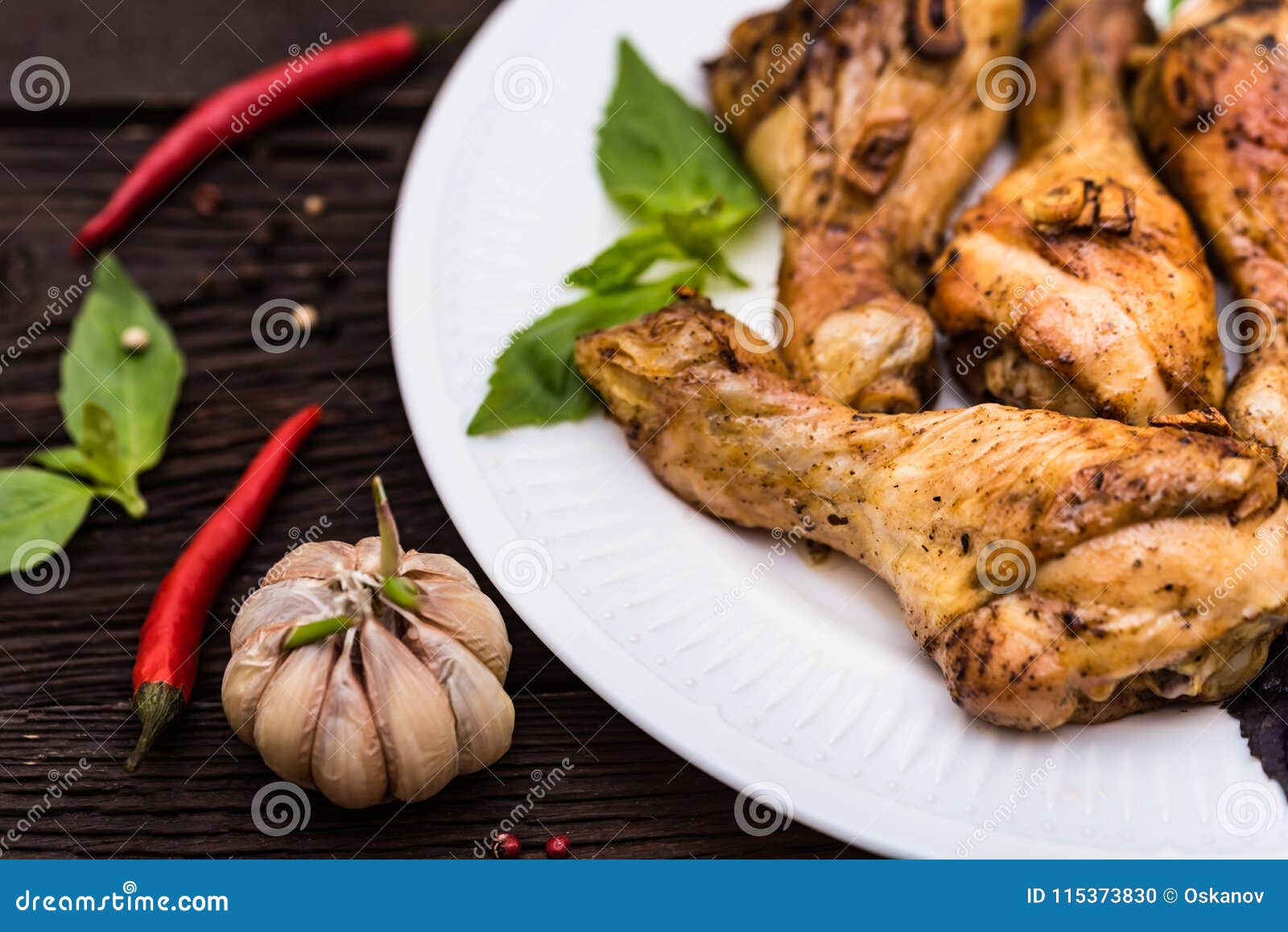 Roasted Chicken Quarter Legs on Rustic Background Stock Photo Image