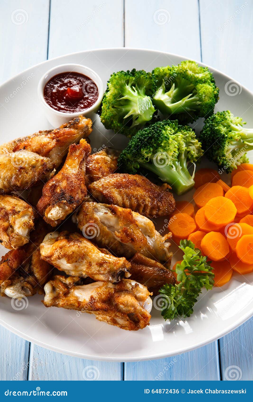 Roasted chicken wings stock photo. Image of garnish, calorie 64872436