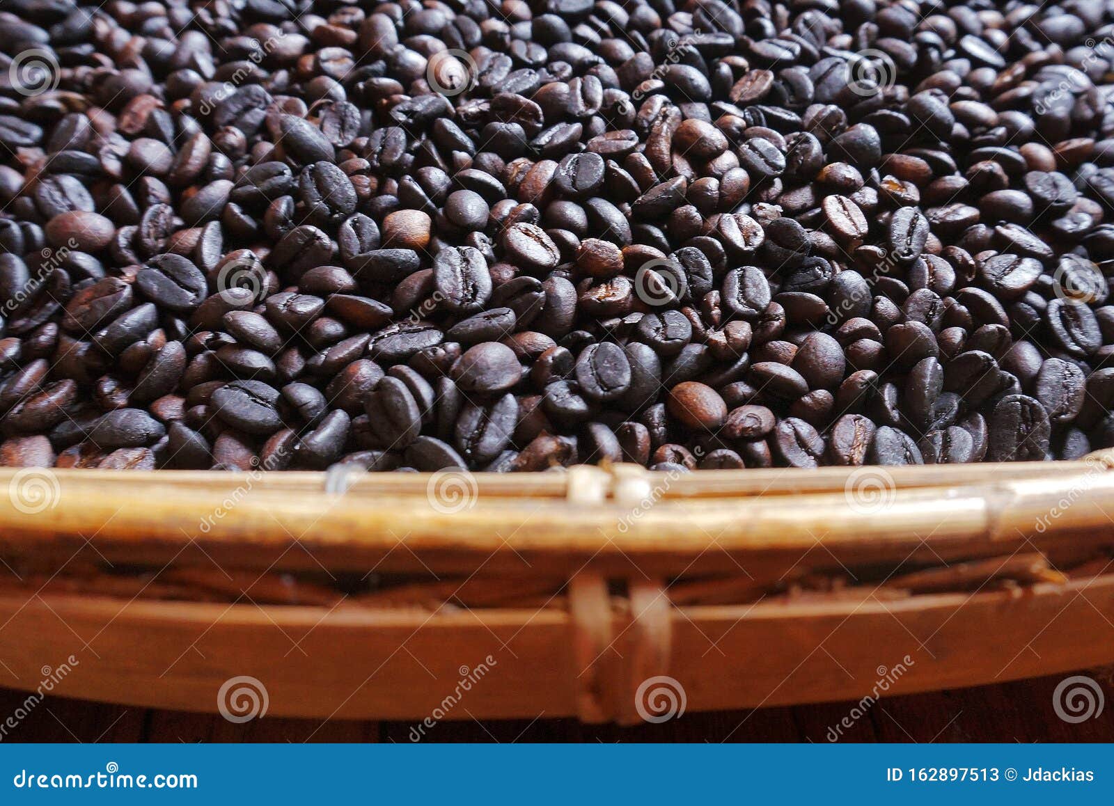 roasted coffee beans in winnower