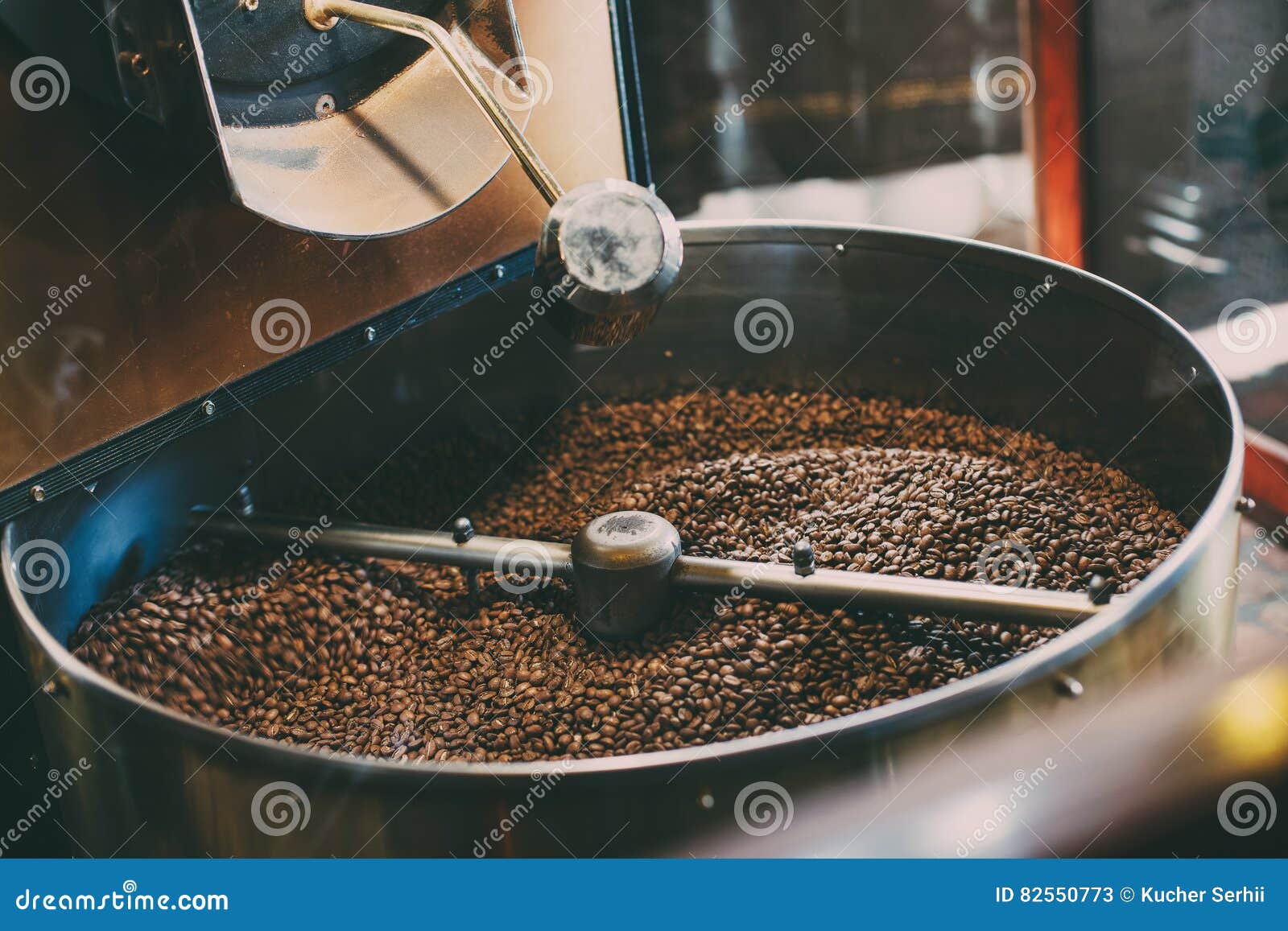 Roasted coffee in roaster stock image. Image of caffeine 82550773