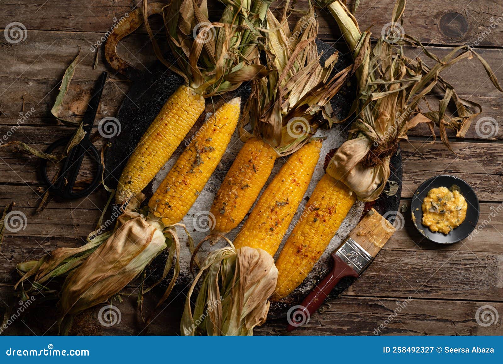 Roasted corn with husks stock image. Image of corn, crunchy 258492327