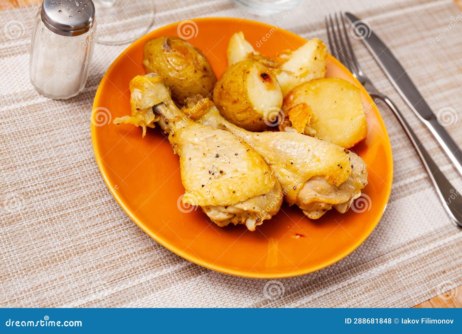 Roasted Drumsticks and Potatoes Served on Table Stock Photo Image of