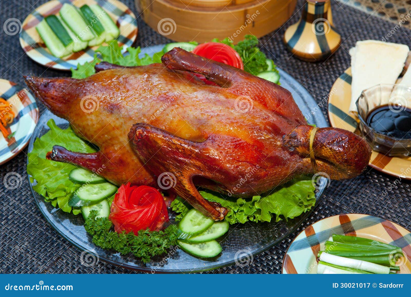 Roasted duck on a plate stock image. Image of crunchy 30021017