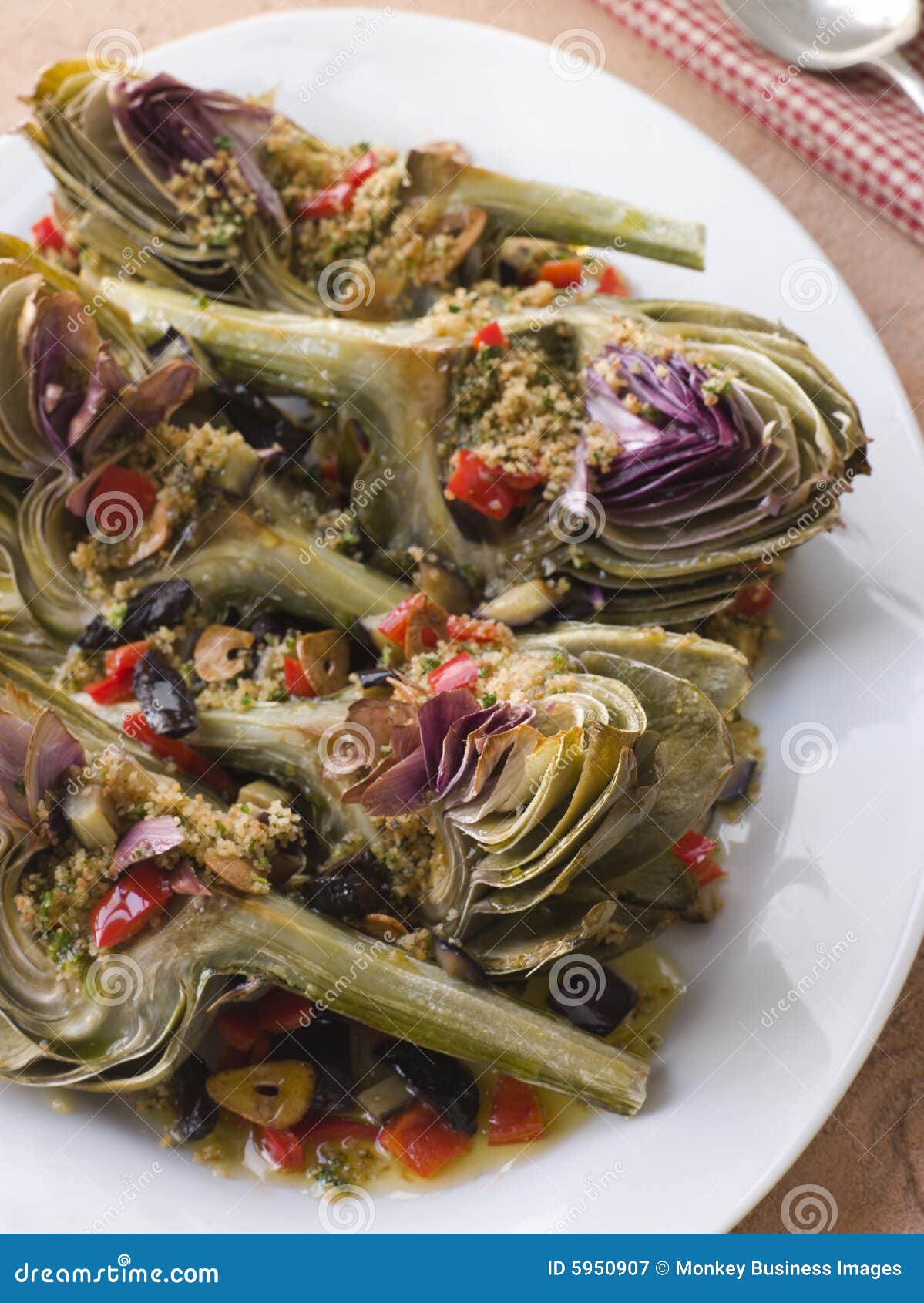 Roasted Globe Artichokes stock image. Image of dressing 5950907
