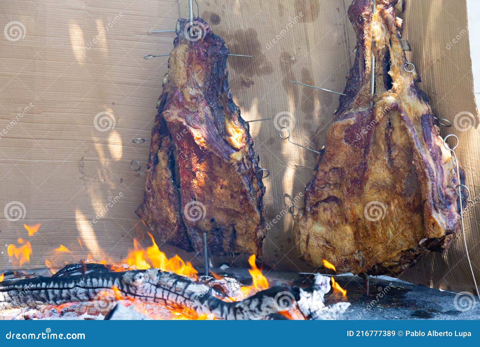 Roasted meat on crosses stock image. Image of wood, grill 216777389