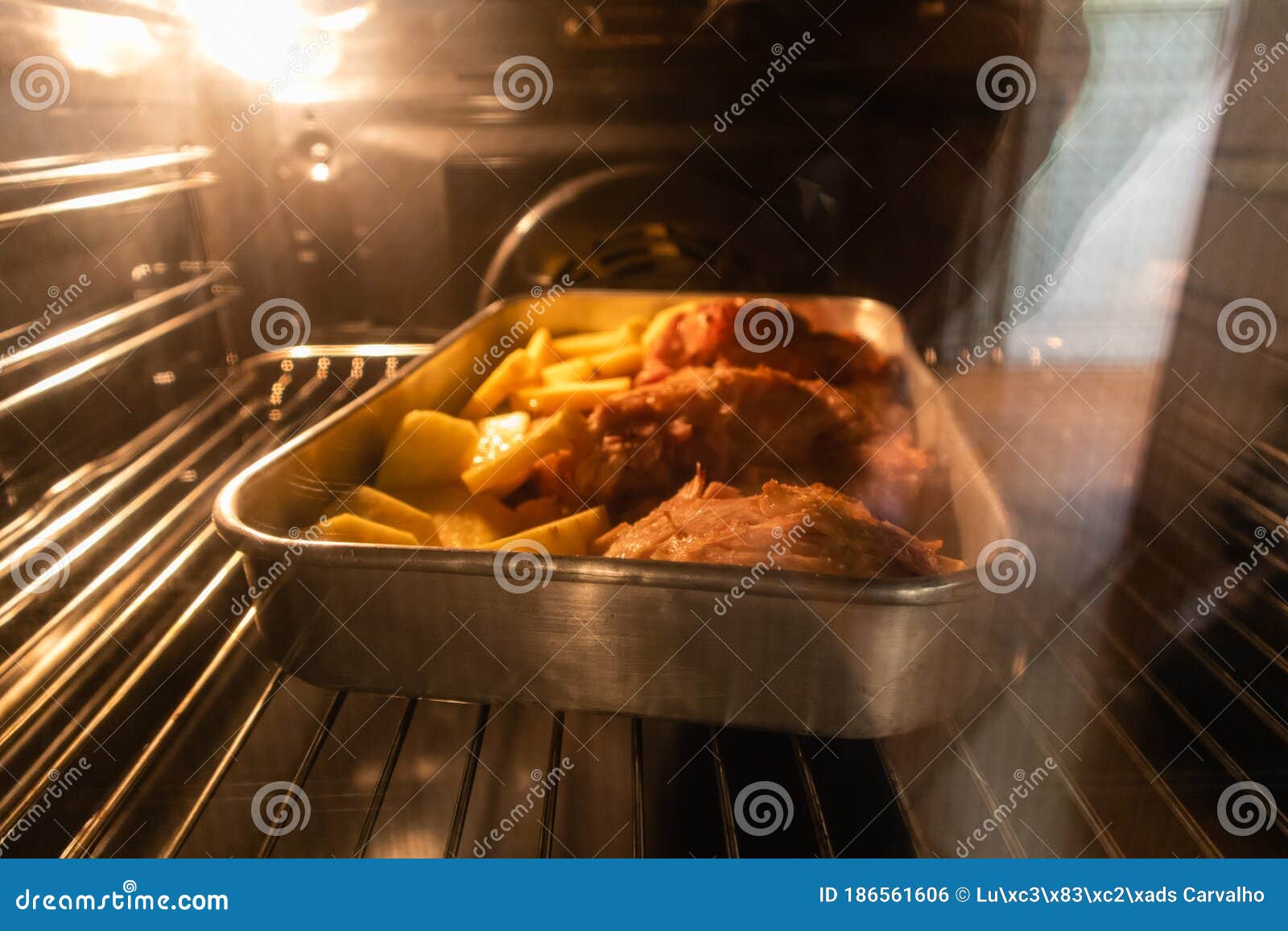 Roasted Meat and Potatoes Inside an Oven Stock Photo Image of oven, roast 186561606