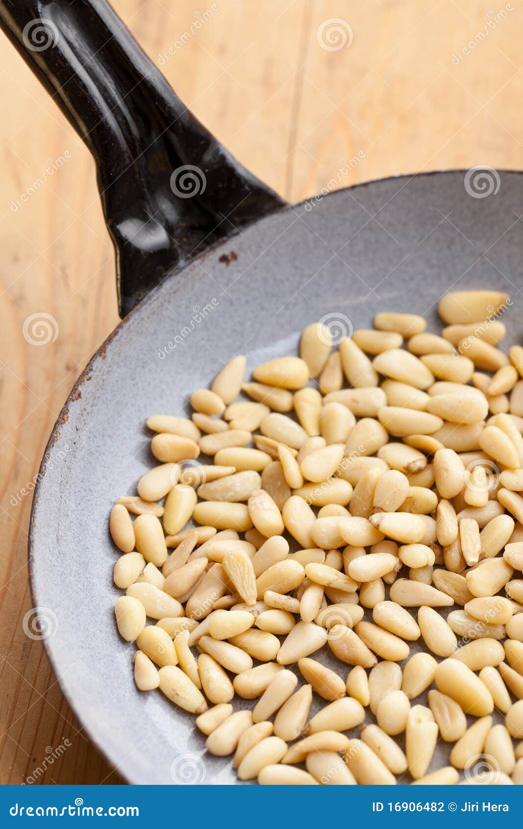 Roasted pine nuts on pan stock photo. Image of nuts, healthy 16906482