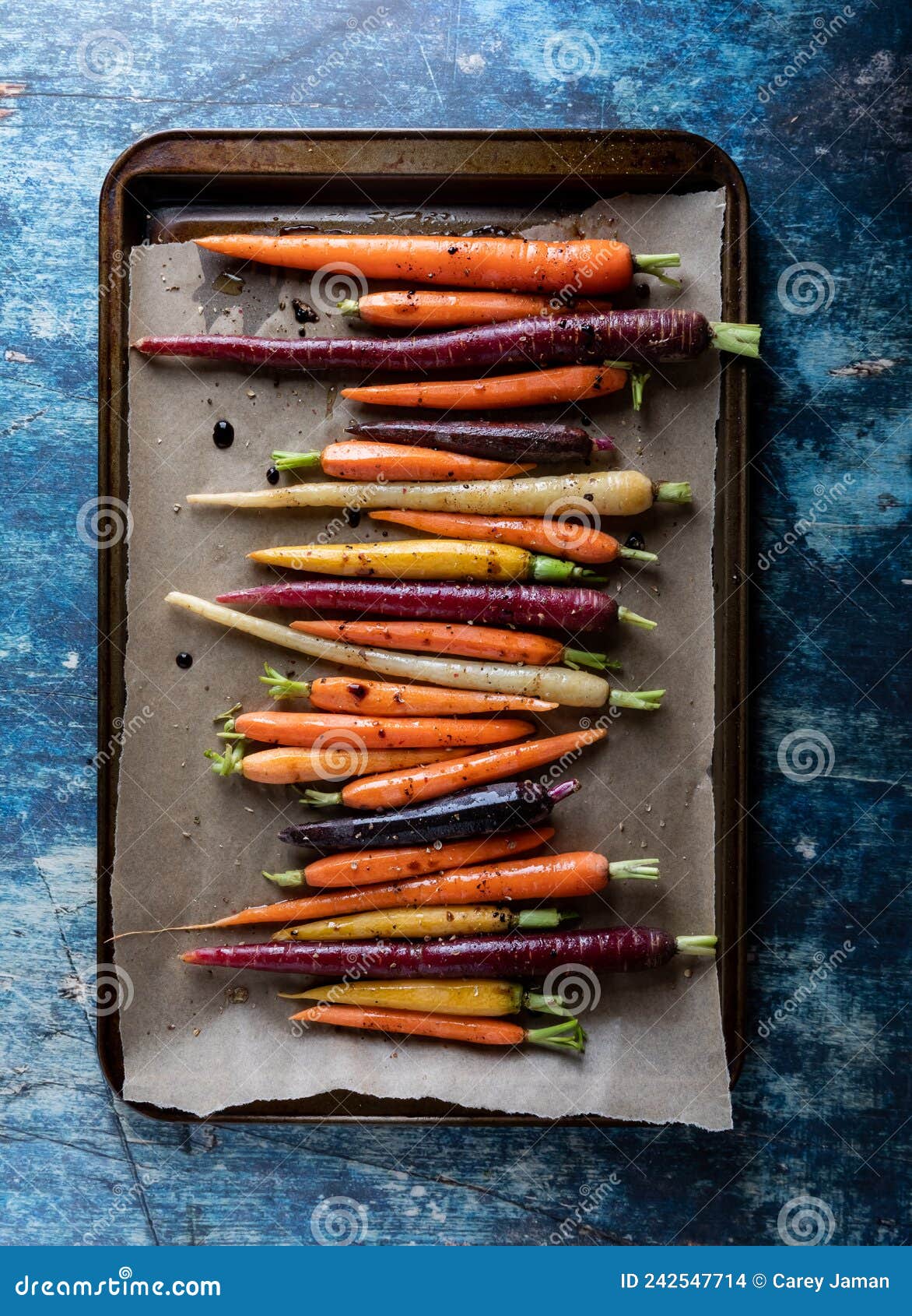 Roasted Rainbow Carrots on a Parchment Lined Baking Sheet. Stock Photo Image of vibrant, root