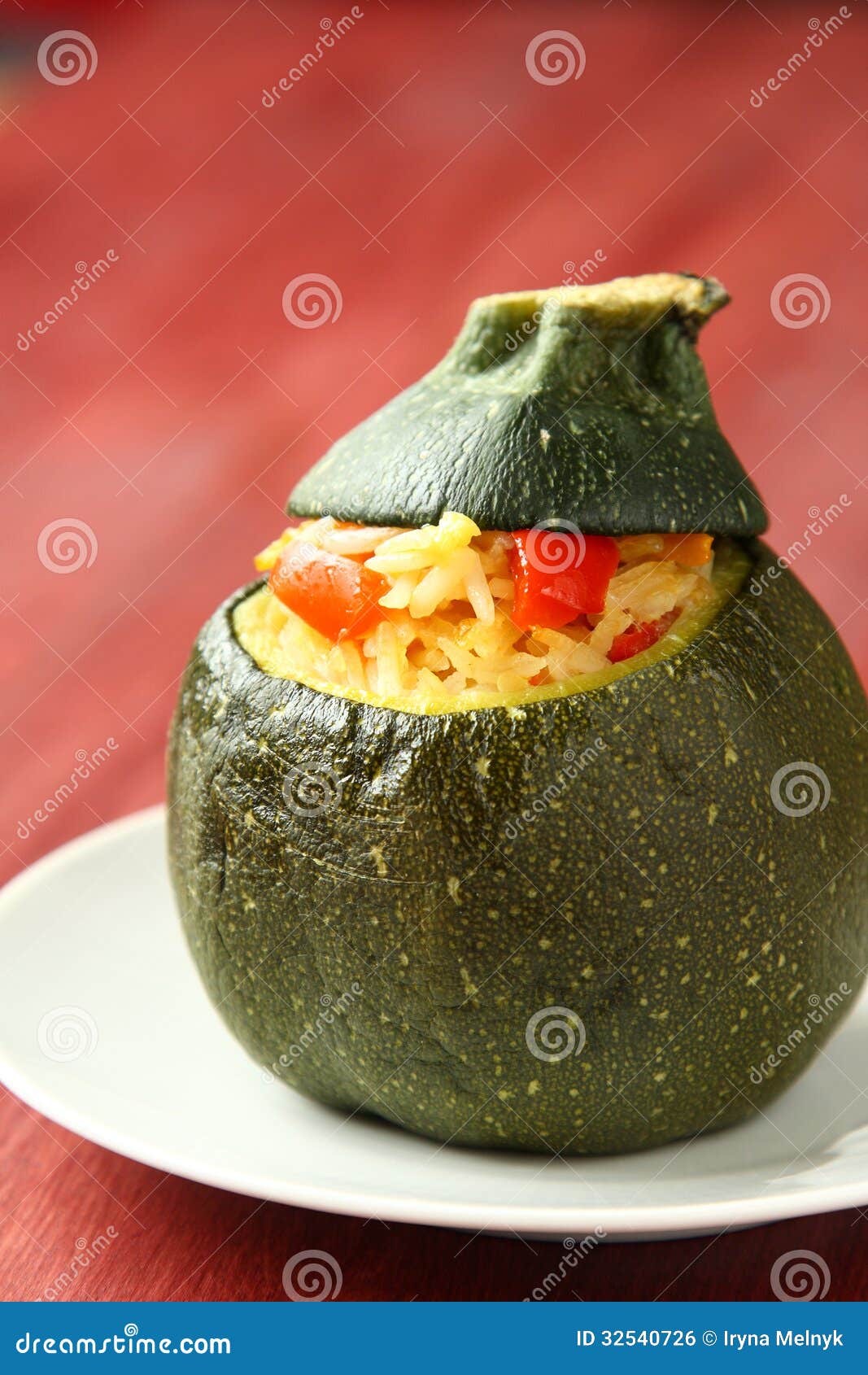 Roasted Round Zucchini Stuffed Rice and Vegetables Stock Photo Image