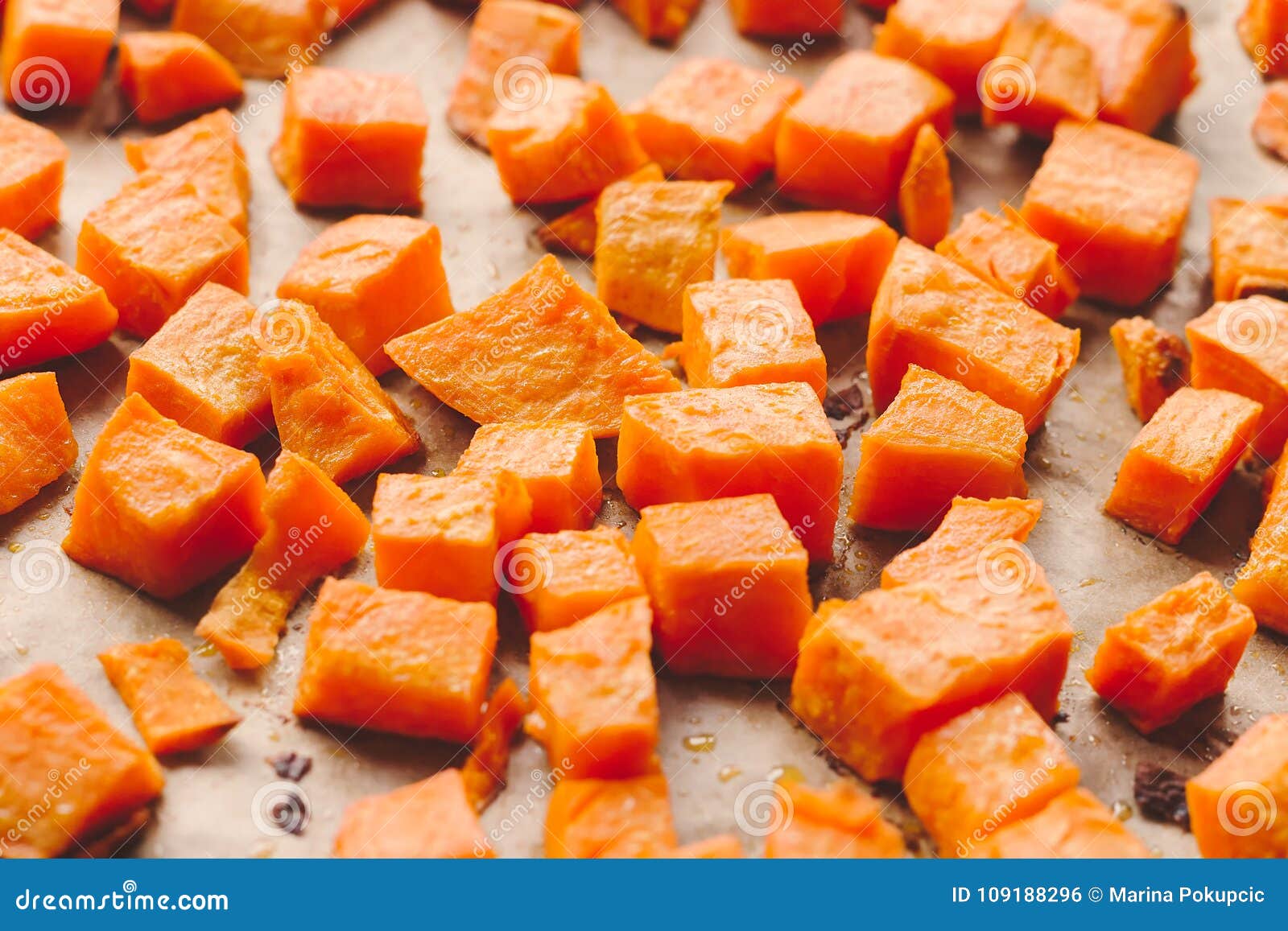 Roasted Sweet Potato Cubes on a Baking Paper Stock Photo Image of