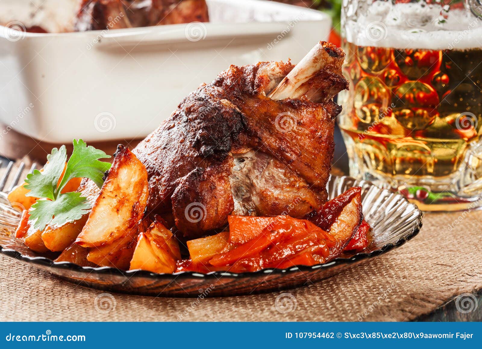 Roasted Turkey Knuckle with Potatoes and Vegetable Stock Photo - Image ...