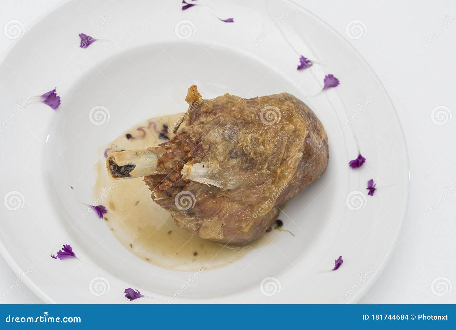 Roasted Turkey Leg, Served with White Sauce, Decorated with Herbs Stock
