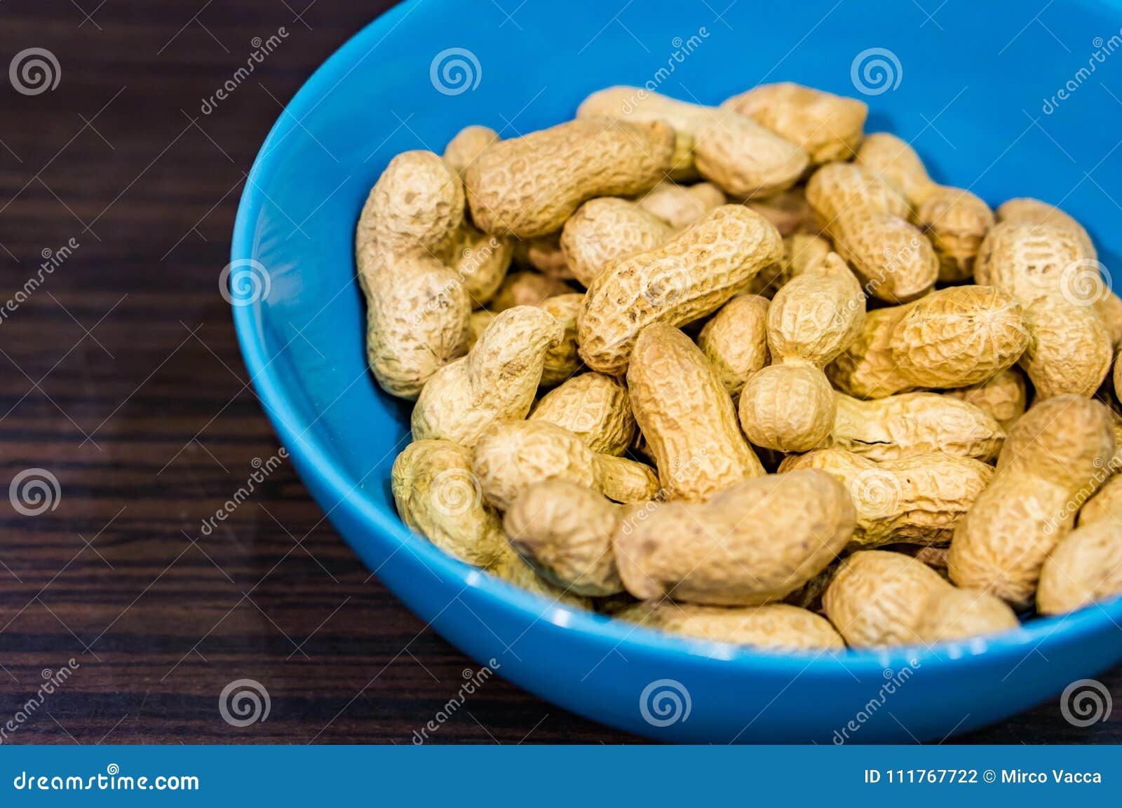 Peanuts in a bowl stock photo. Image of peanuts, surface 111767722