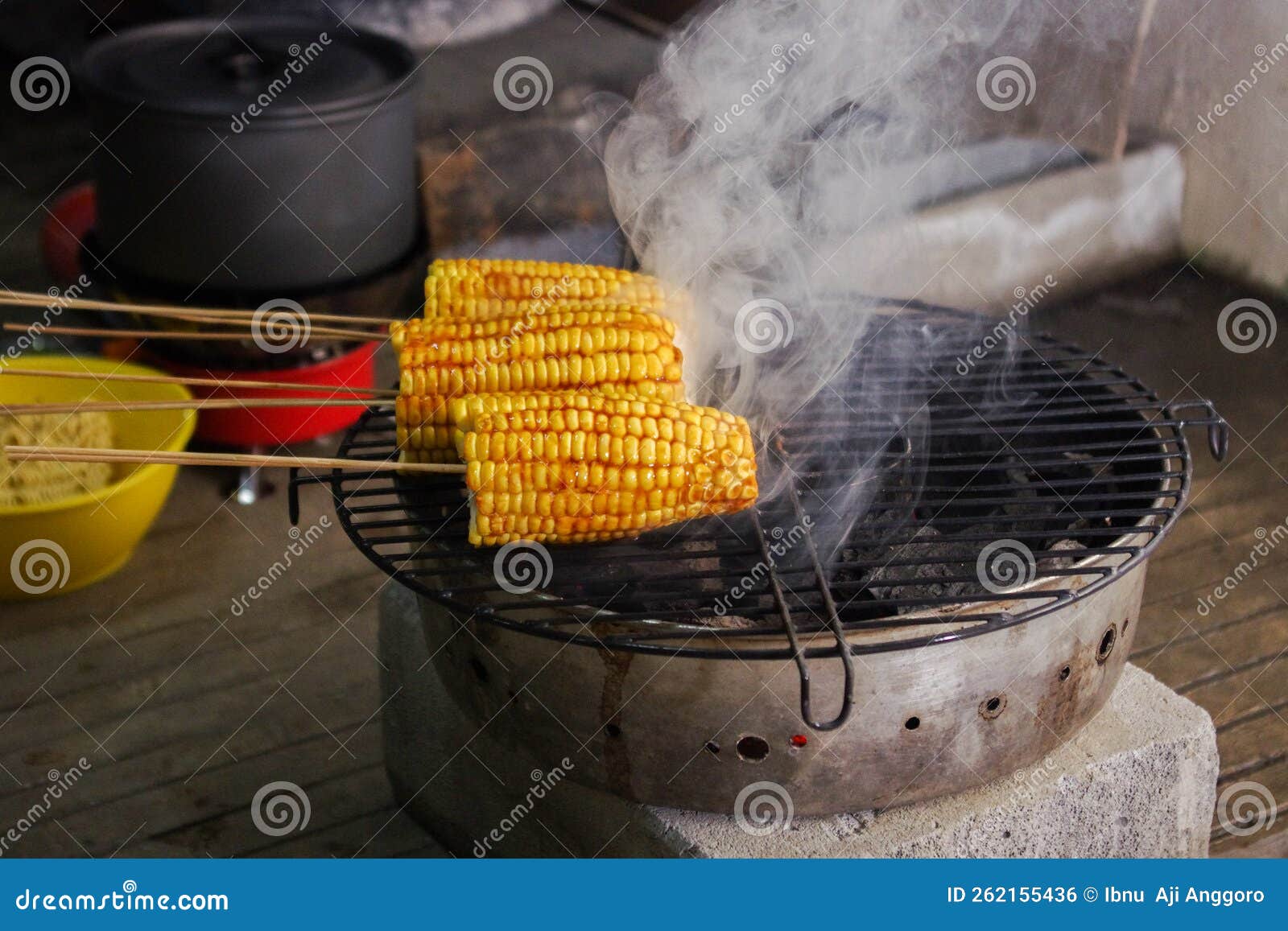 Roasting corn on the grill stock photo. Image of fish 262155436