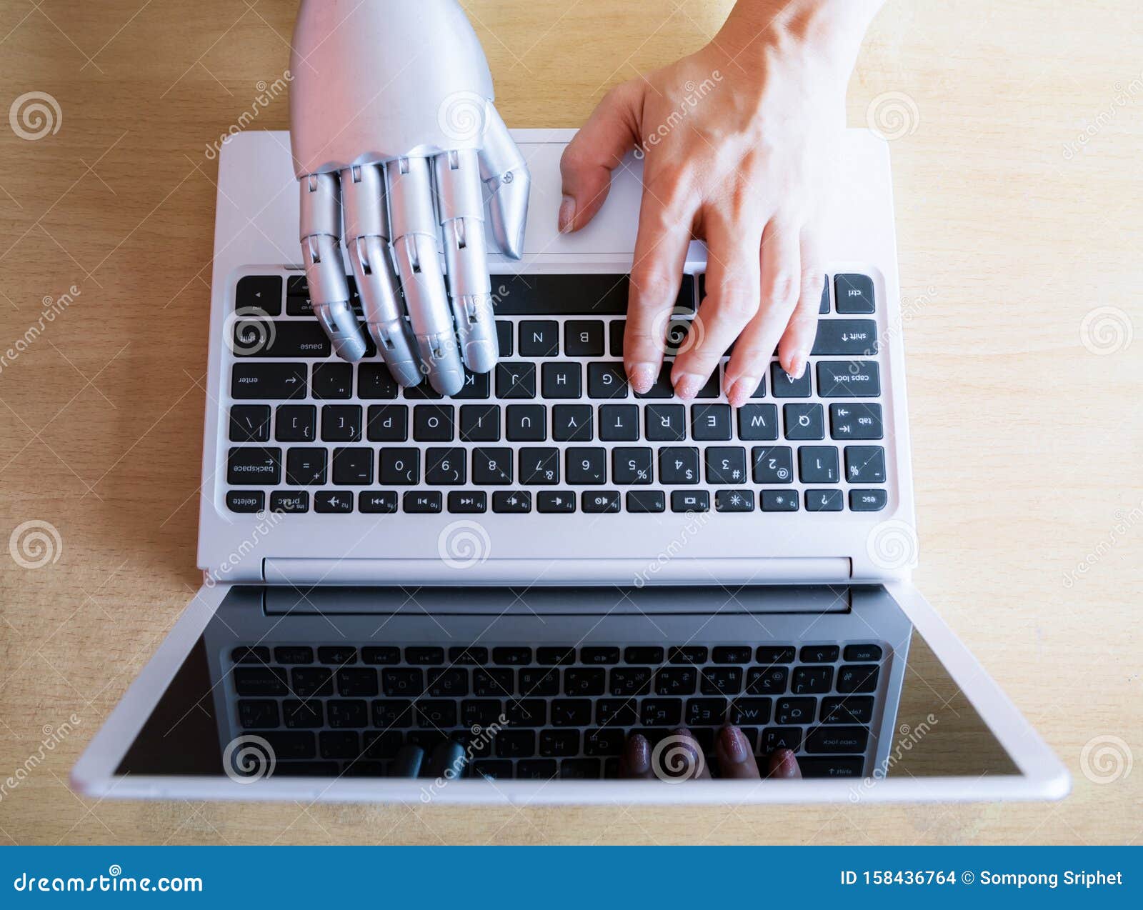 robot hands and fingers point to laptop button advisor chatbot robotic artificial intelligence