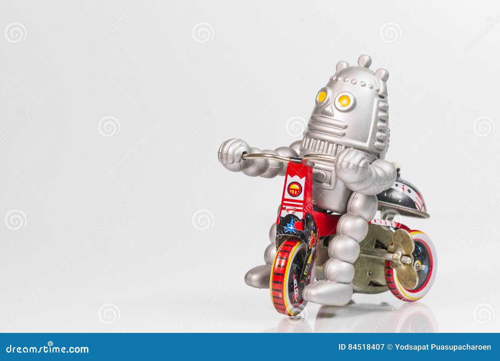 A Robot Toy is Riding Bicycle Stock Image Image of style, cloth 84518407