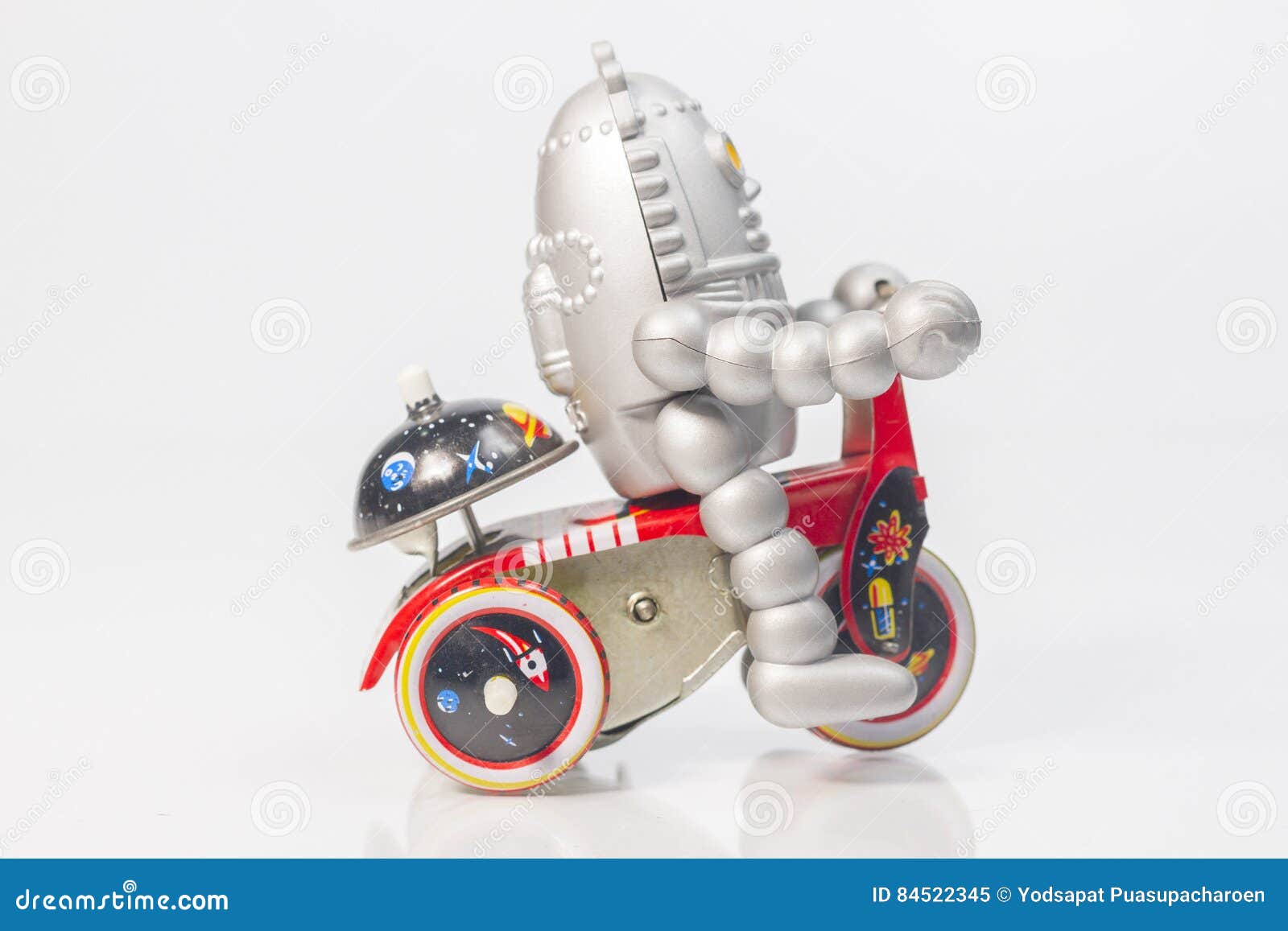 A Robot Toy is Riding Bicycle Stock Image Image of head, bicycle