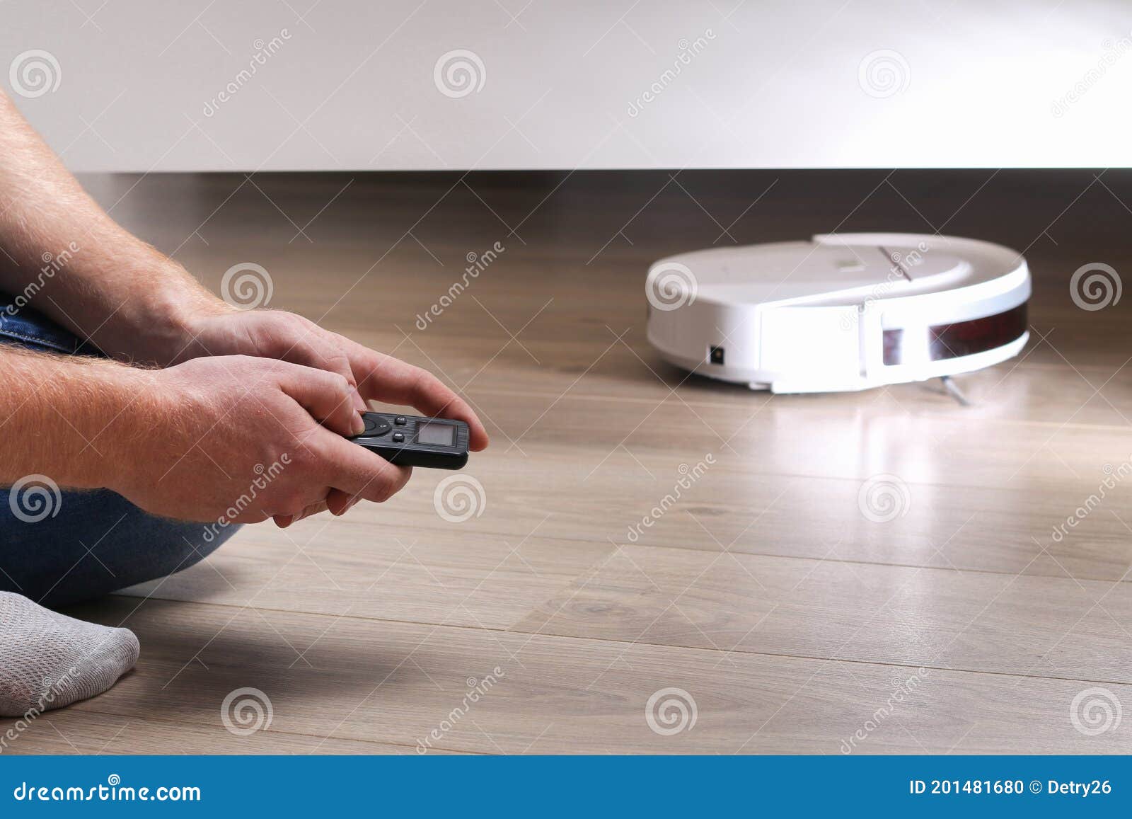 The Robot Vacuum Cleaner Cleans Under Bed Stock Photo Image of floor