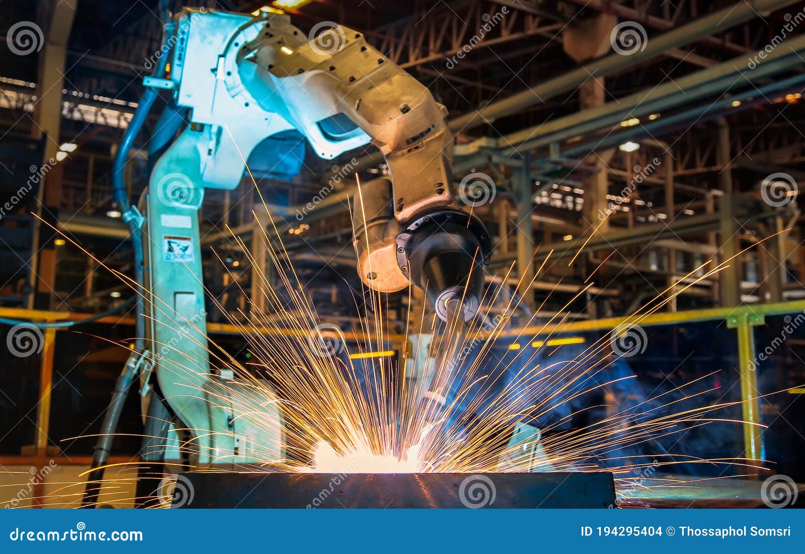 robot is welding in car factory