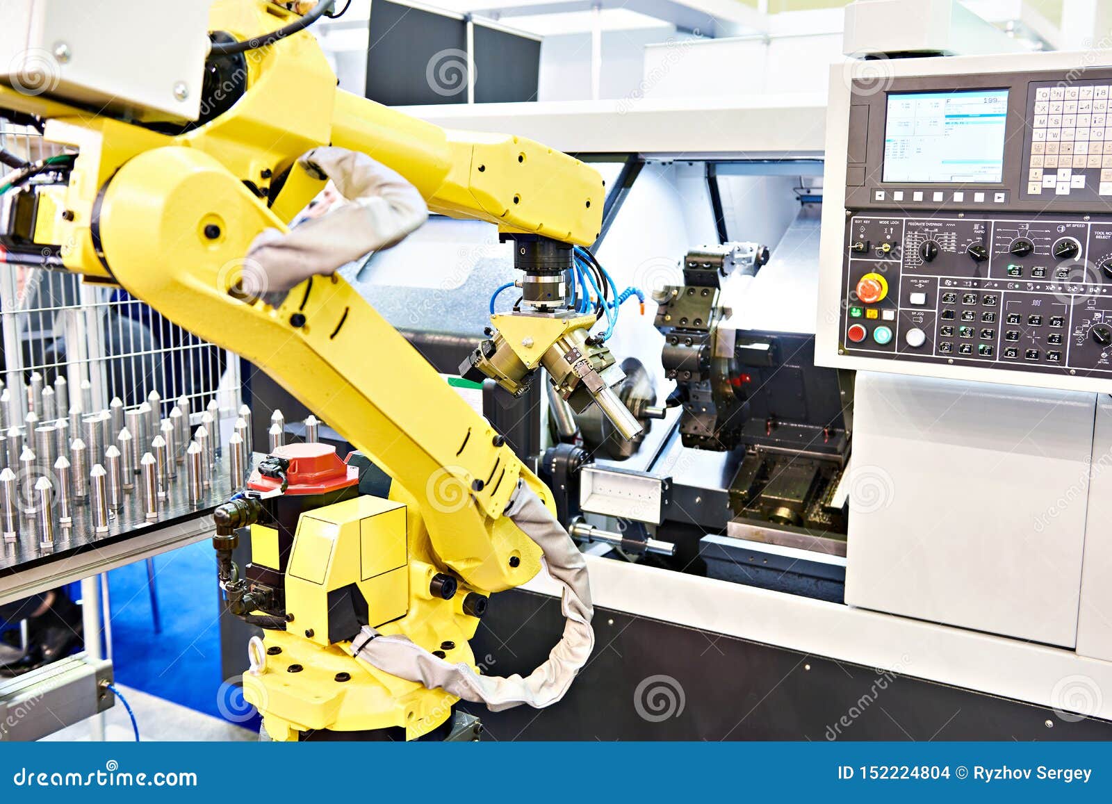 Robotic arm and cnc lathe stock photo. Image of automatic - 152224804