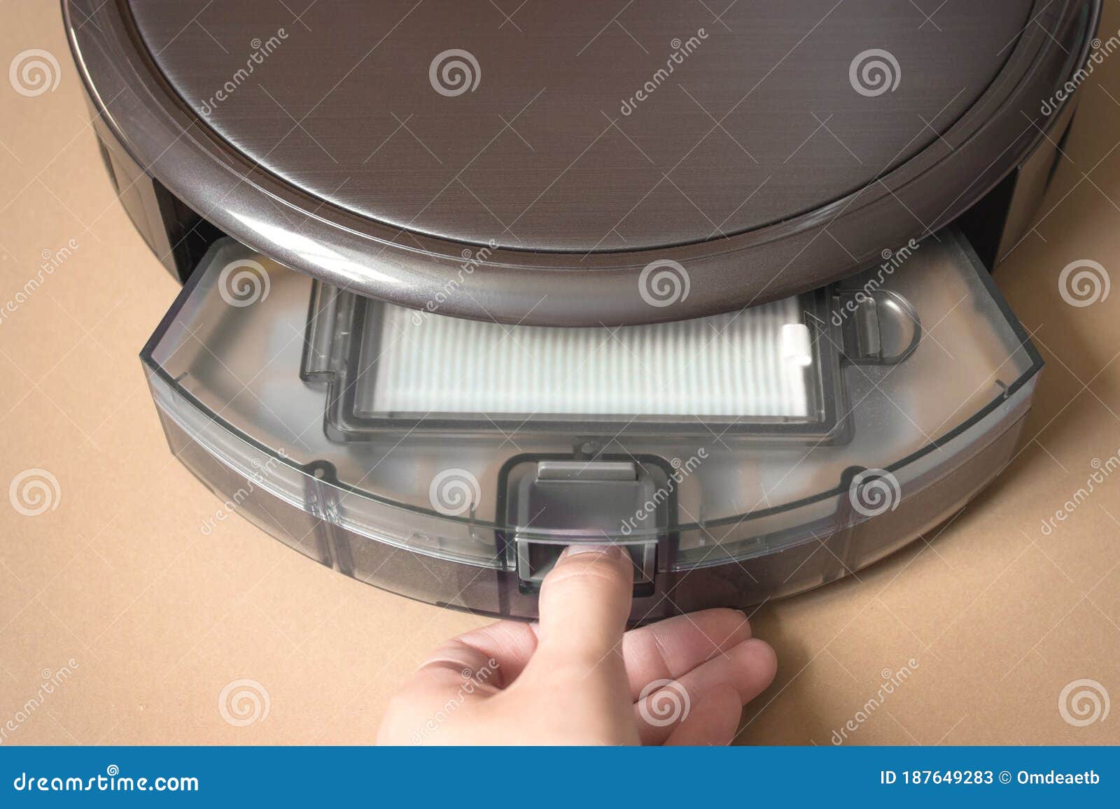 Robotic Vacuum Cleaner. Container with Garbage from a Smart Robot