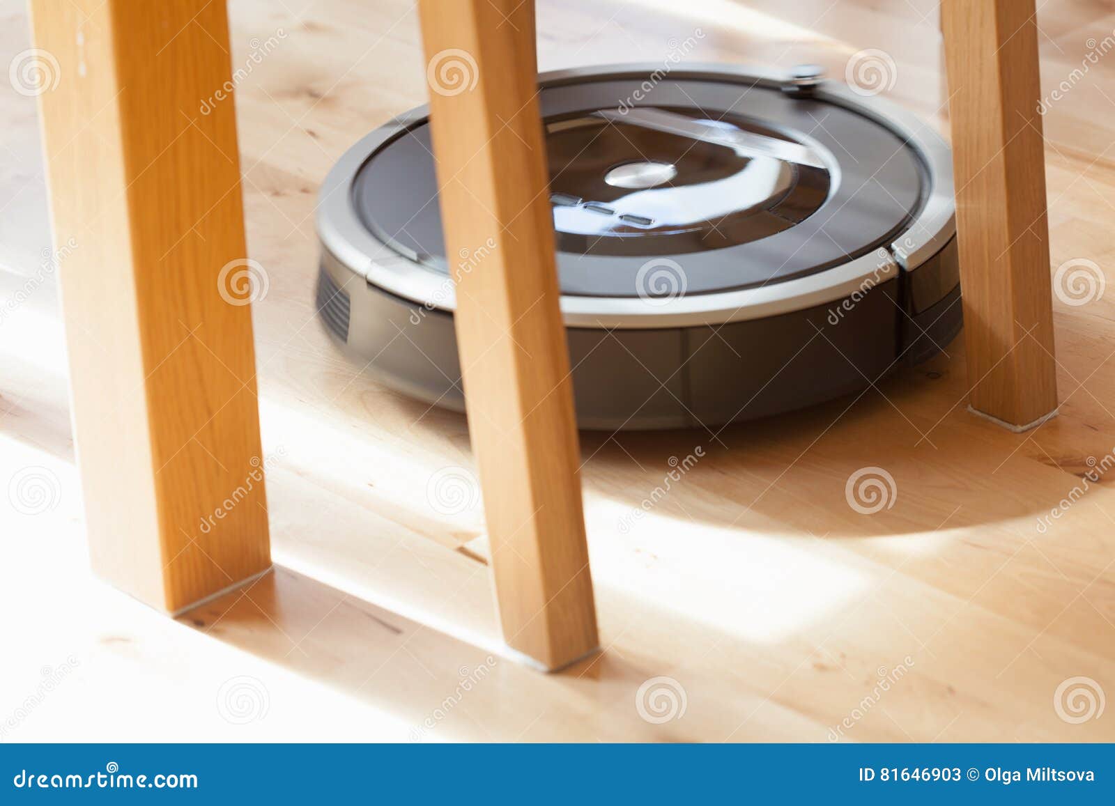 Robotic Vacuum Cleaner on Laminate Wood Floor Smart Cleaning Technology