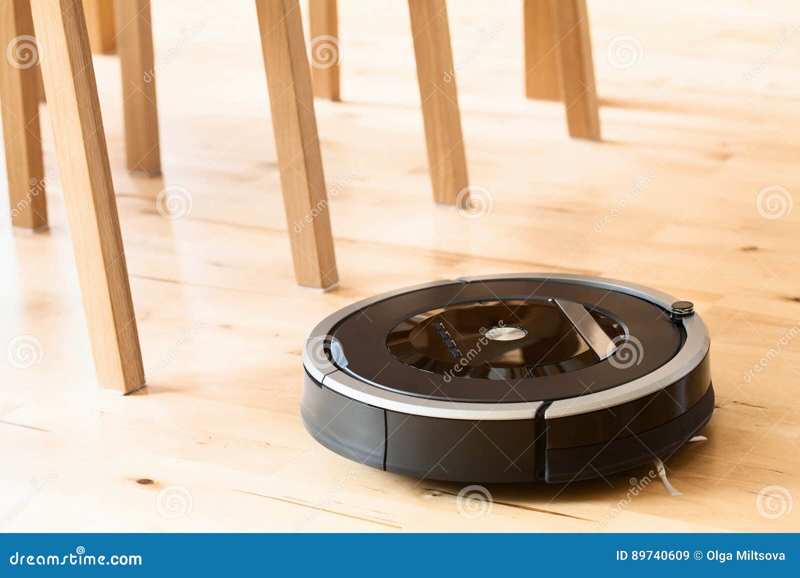 Robotic Vacuum Cleaner on Laminate Wood Floor Smart Cleaning Technology