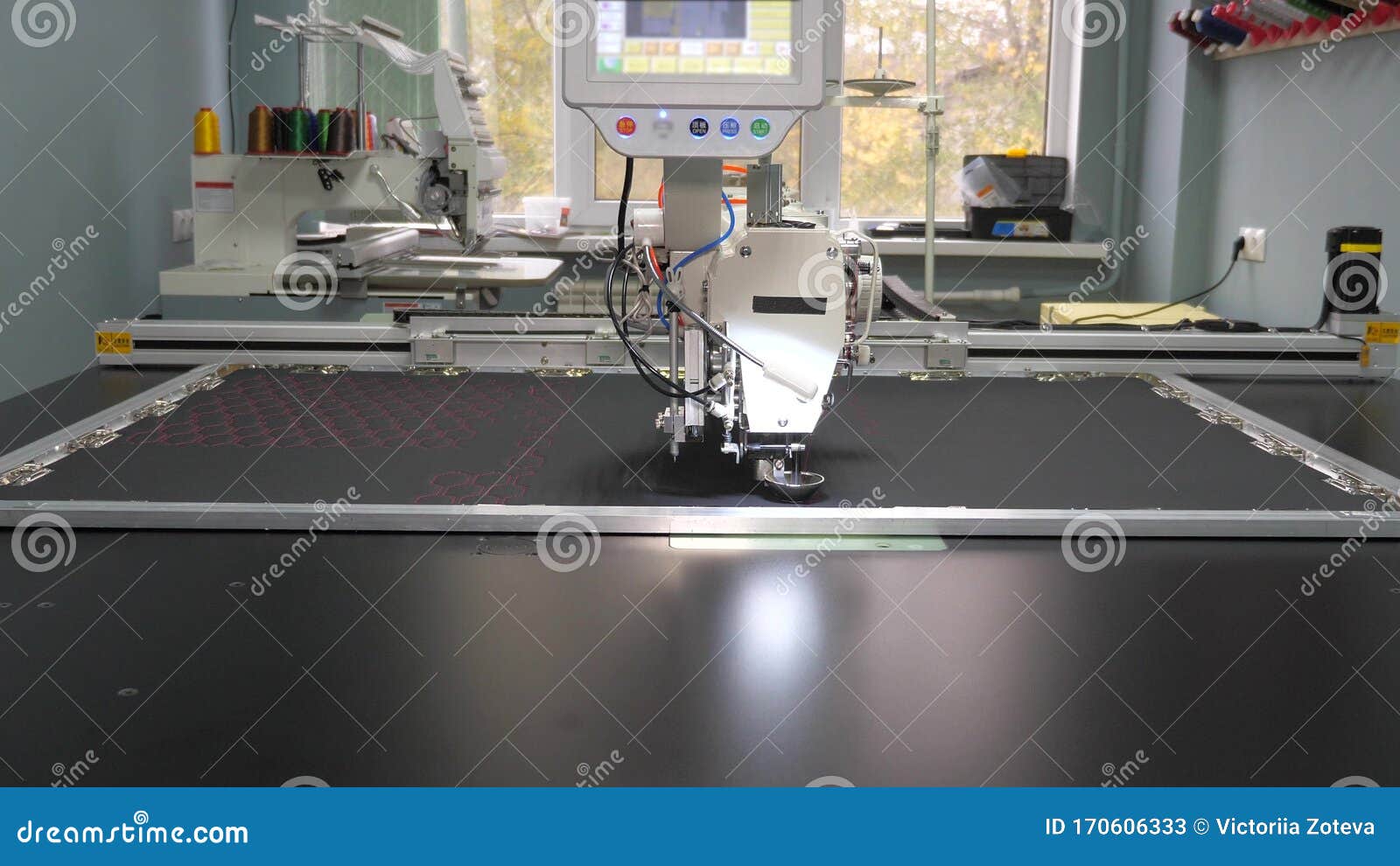 Robotics with Cnc Works in Sewing Production Line. Robot Sewing Machine
