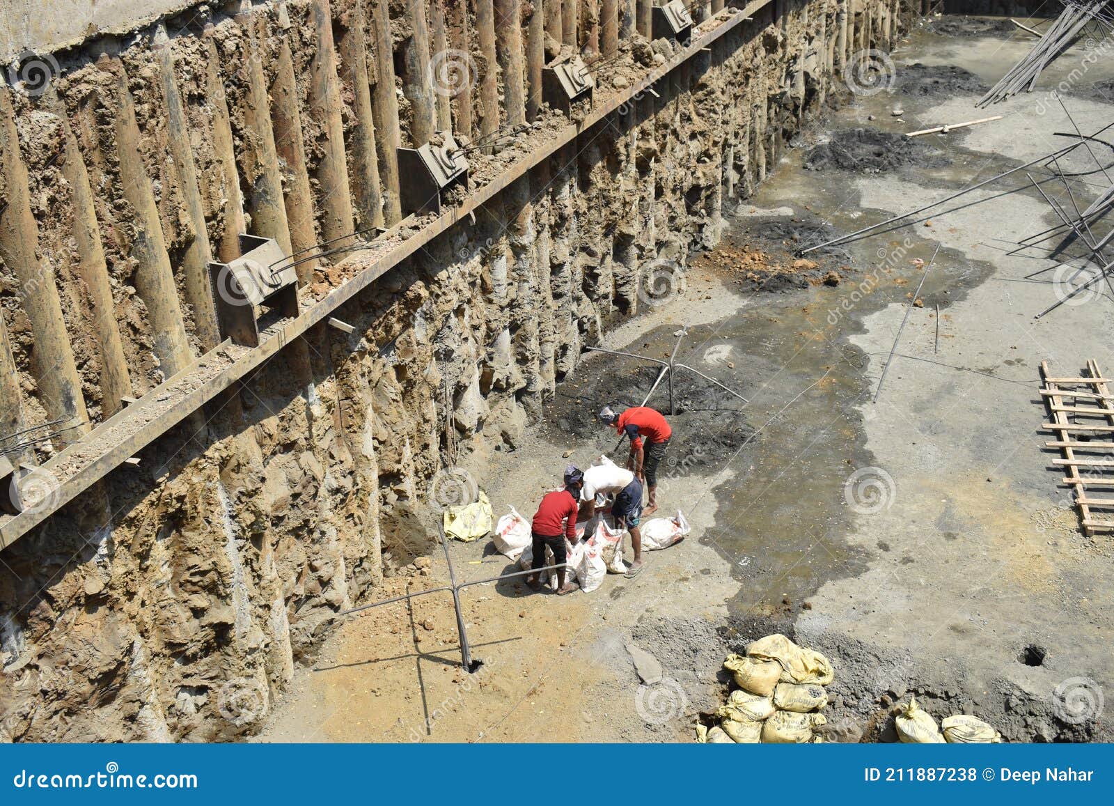Rock Anchoring at Construction Site .workers Manufacturing Cement and