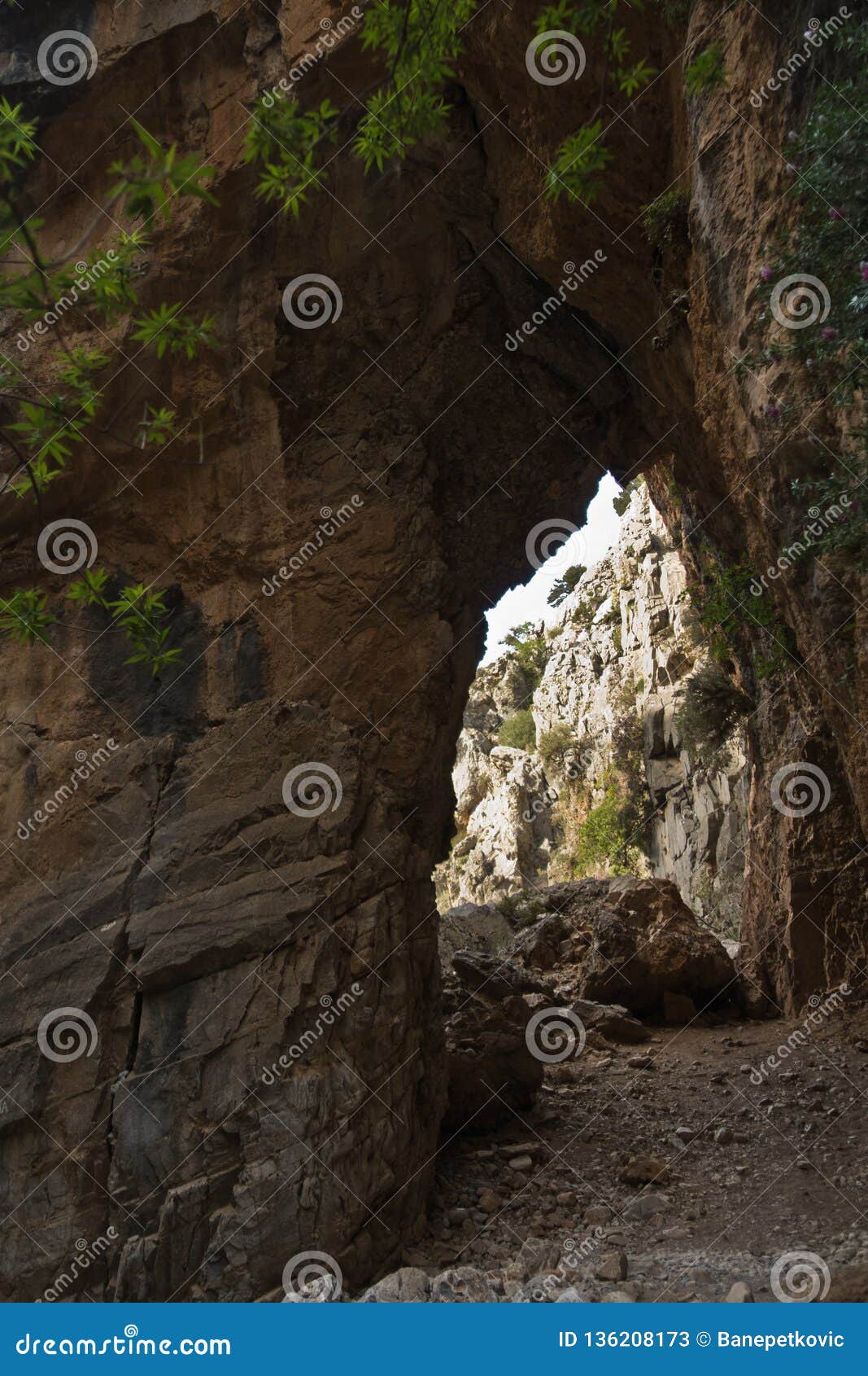 rock arch on trekking trail at imbros gorge near chora sfakion, island of crete