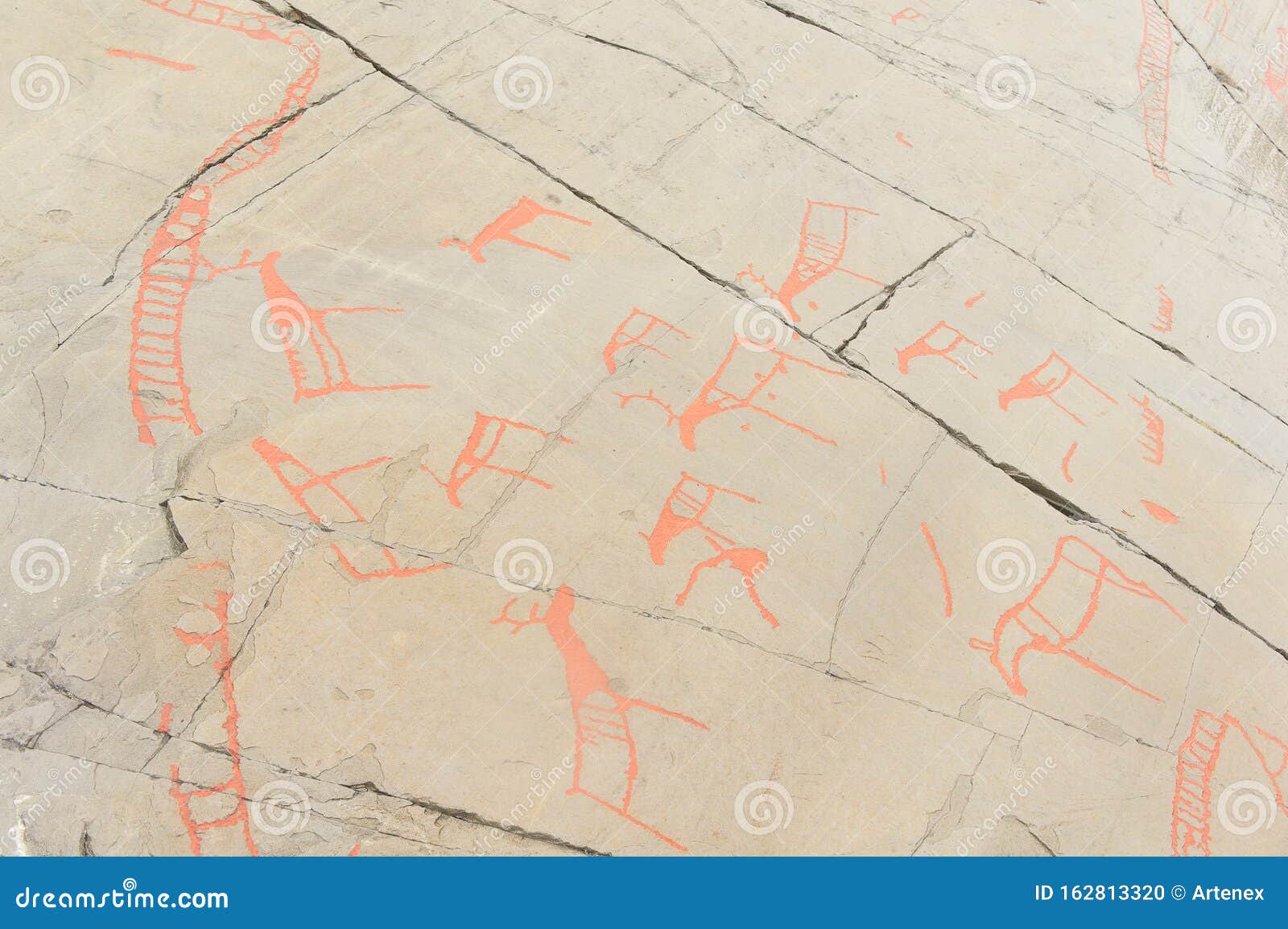 rock art in alta fjord, norway. ancient s, real drawing,  texture in stone. red ocher paint. human preys on animals deer.