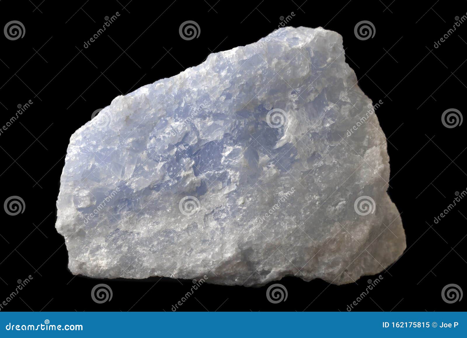 rock of blue calcite mineral from brazil  on a pure black background