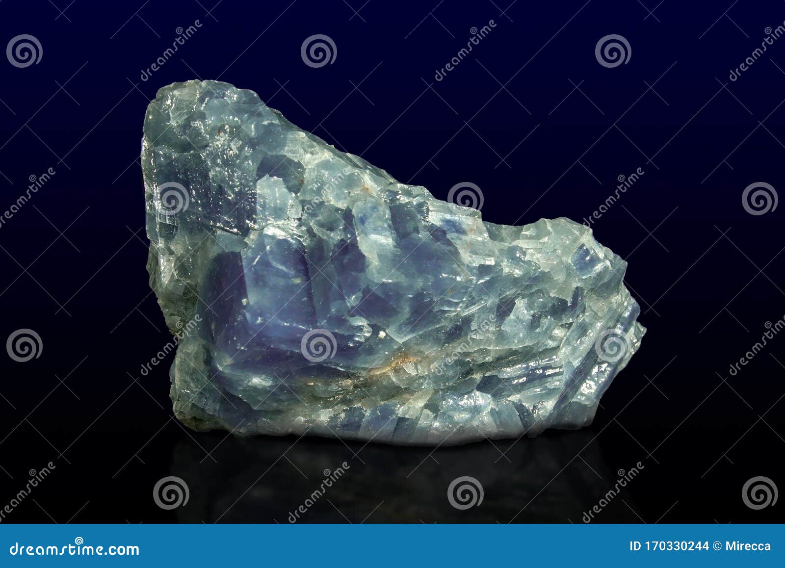 rock of blue calcite mineral on dark background