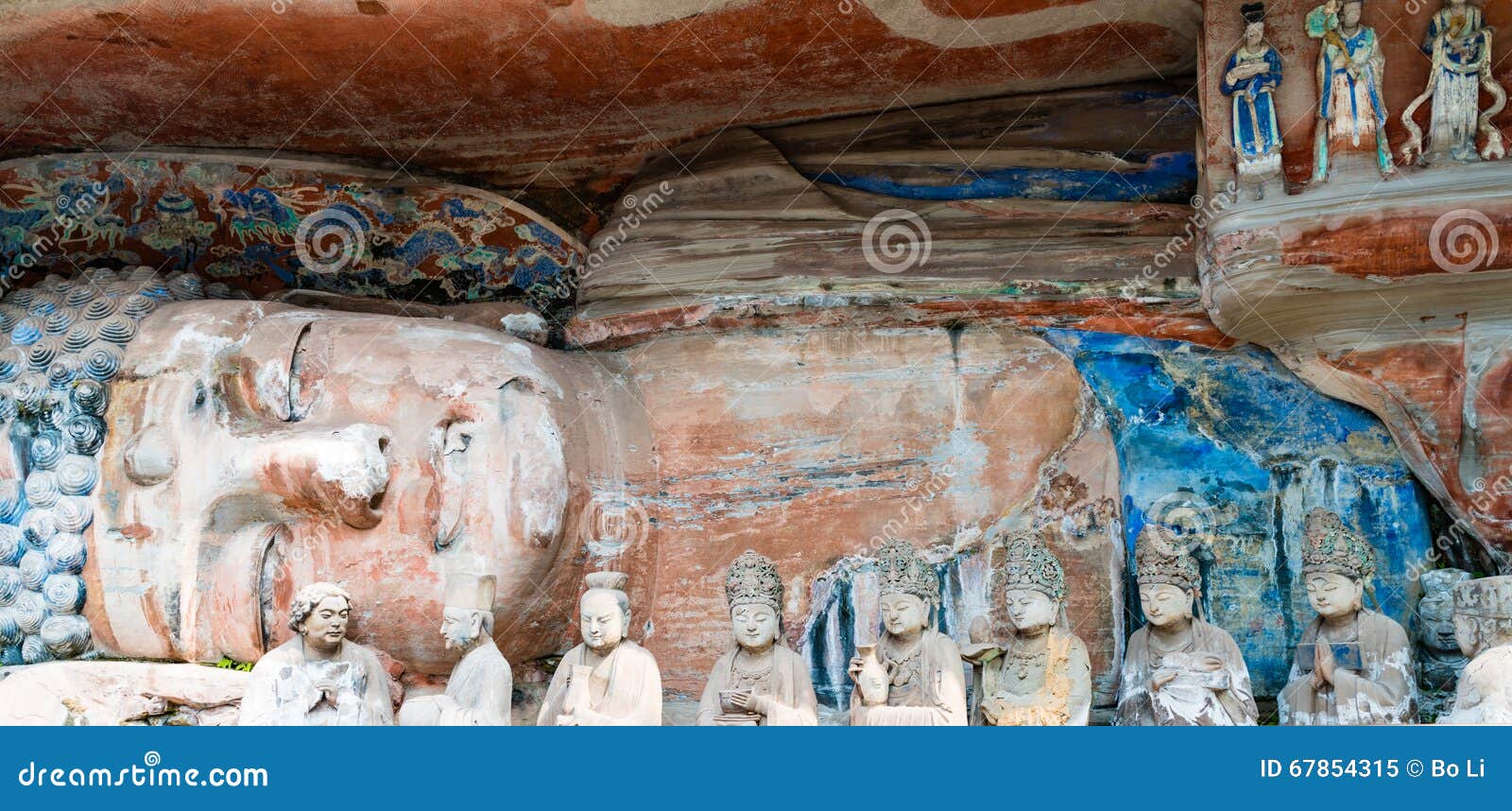 rock carving of sakyamuni buddha entering nirvana, with his disciples