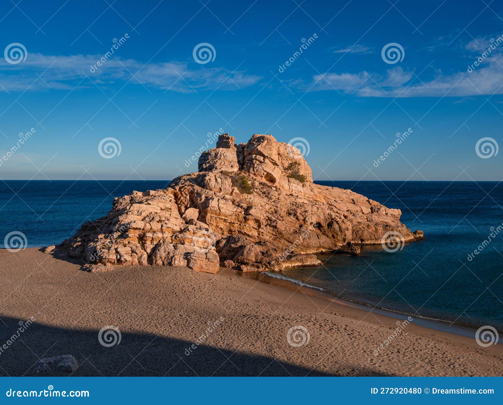 Rock on the Coast of Tarragona, Spain, a Sunset at Sea Stock Photo