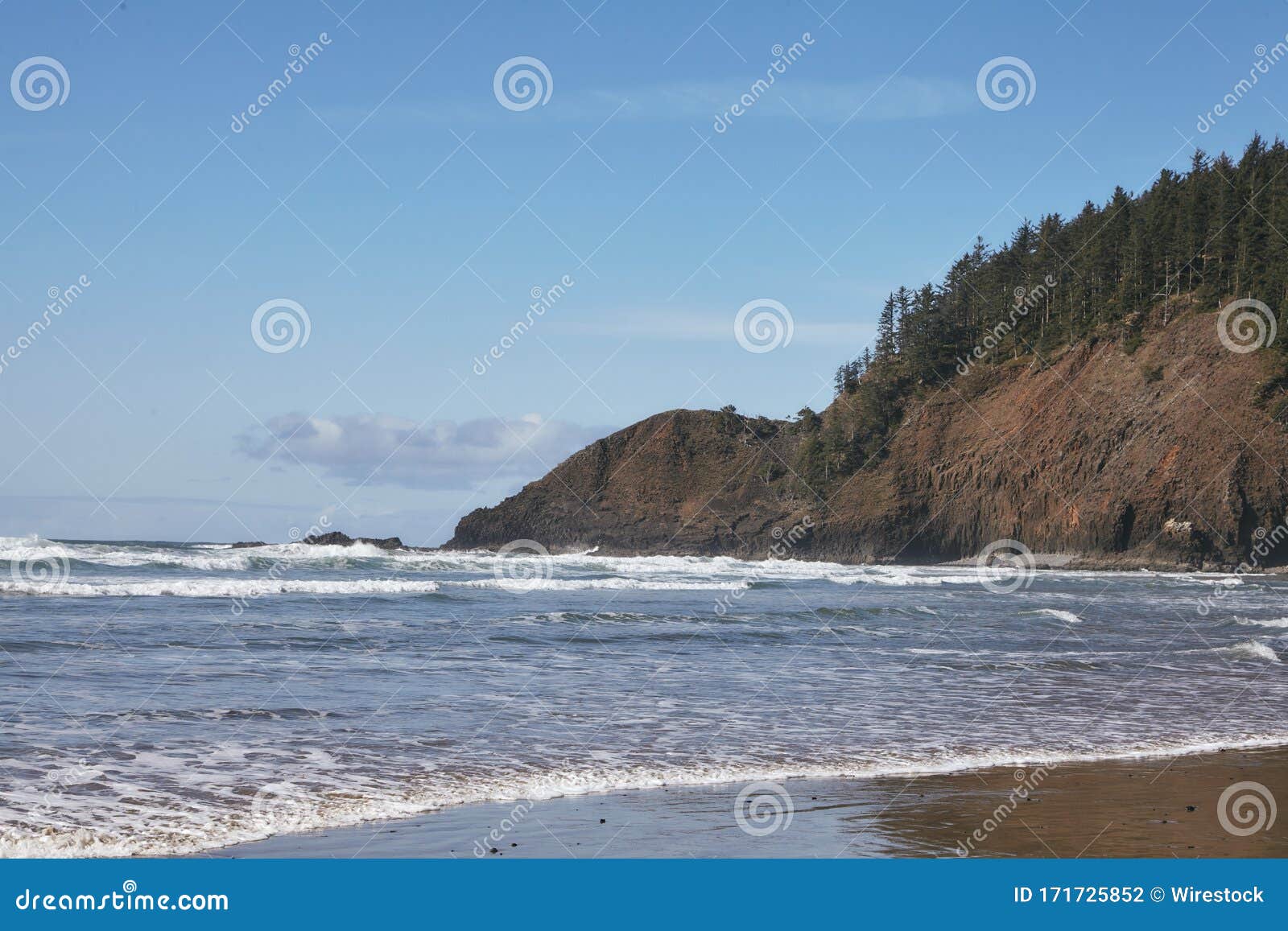 Rock Formation at the Shore of the Pacific Ocean in Oregon Stock Photo